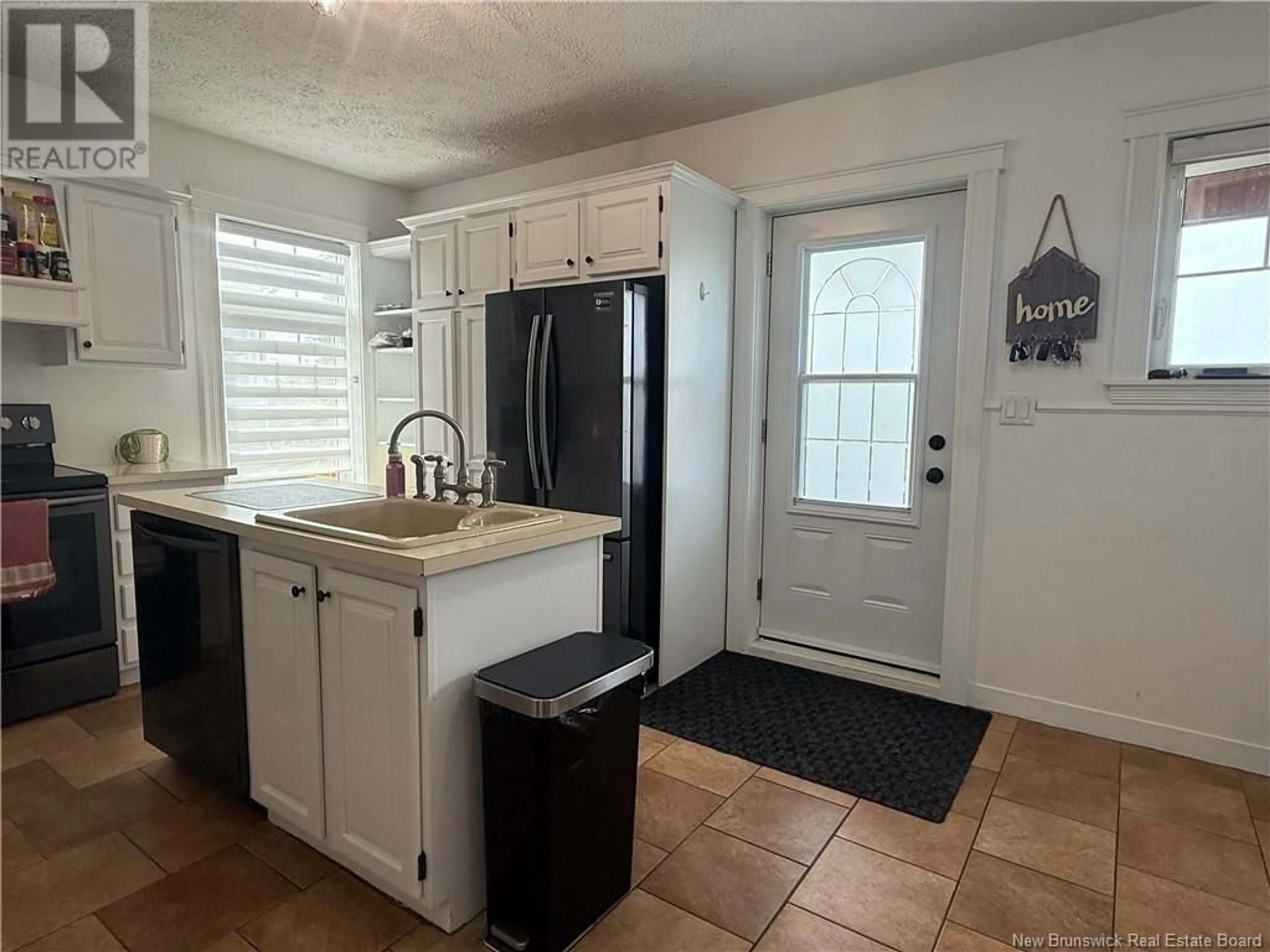 Open concept kitchen, ceramic/tile floor for 227 ST GEORGES STREET, Grand-Sault/Grand Falls New Brunswick E3Y1C3