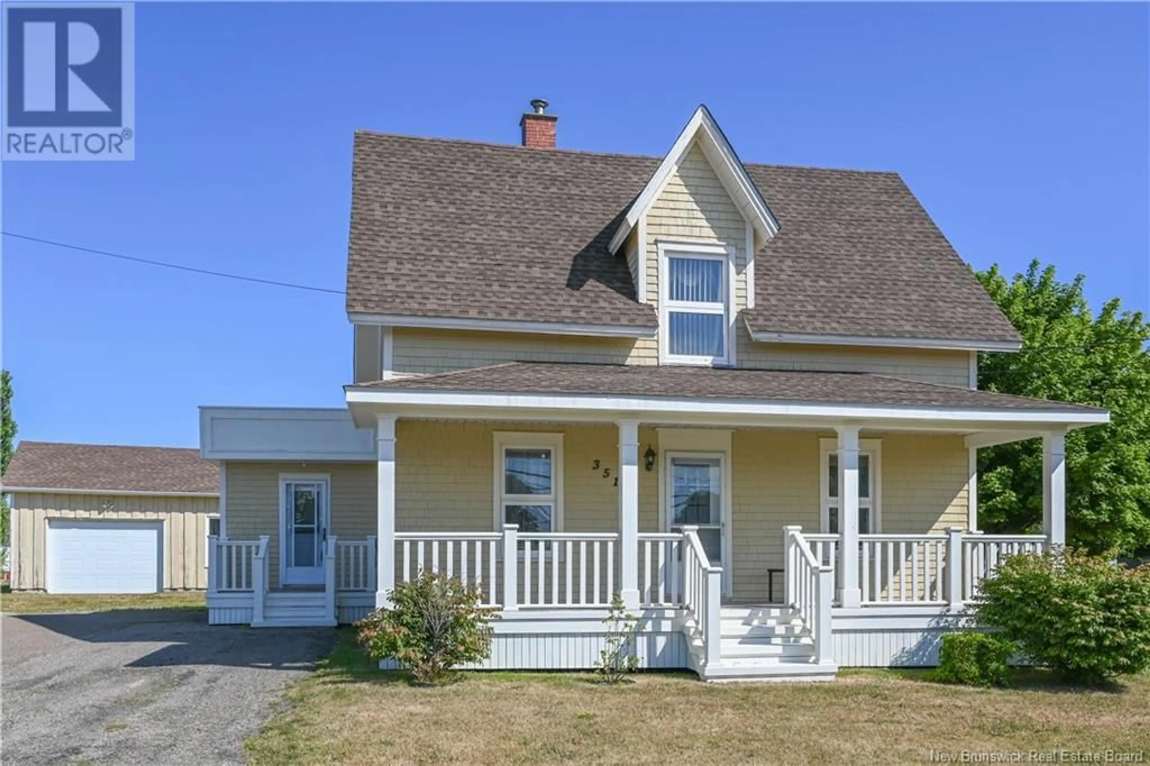 Home with vinyl exterior material, street for 351 SAINT-PIERRE BOULEVARD, Caraquet New Brunswick E1W1B4