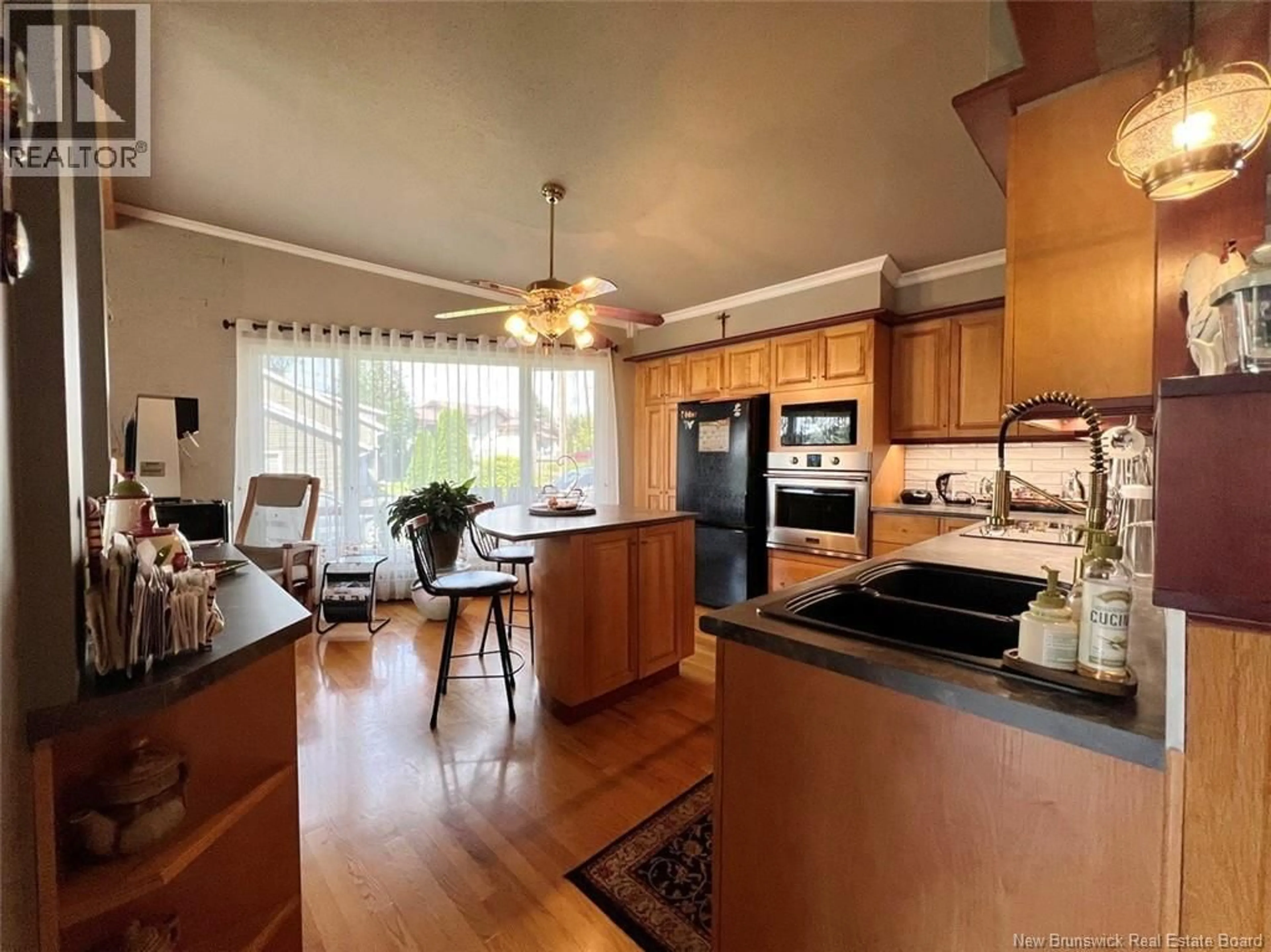 Open concept kitchen, unknown for 15 LEBLOND STREET, Edmundston New Brunswick E3V4K9