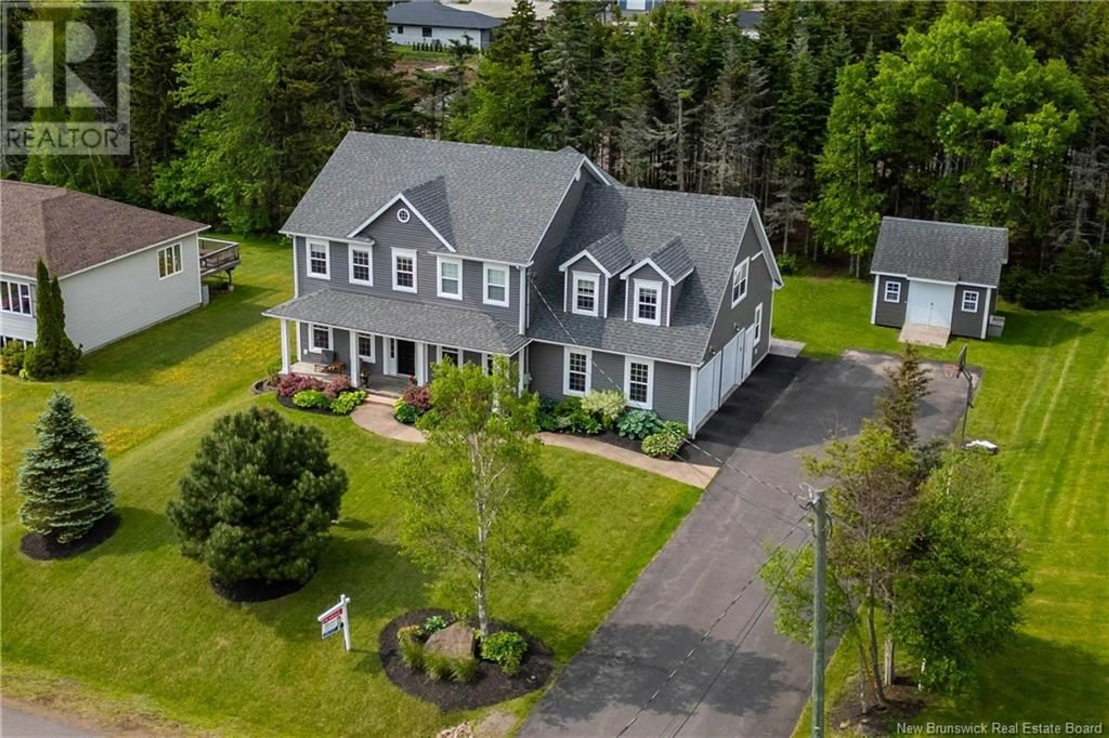 A pic from outside/outdoor area/front of a property/back of a property/a pic from drone, street for 64 FAWCETT AVENUE, Sackville New Brunswick E4L3W9