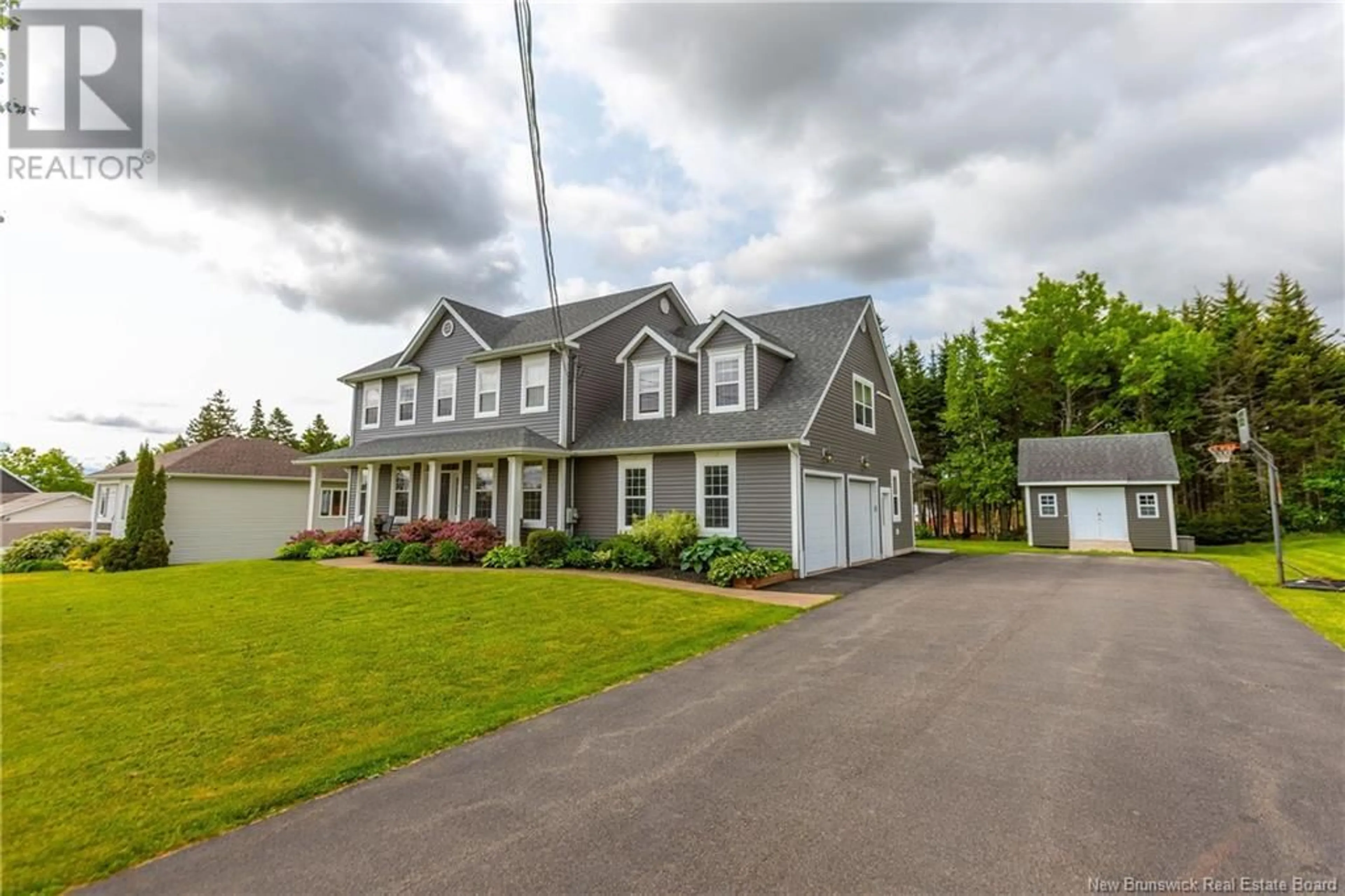 Home with vinyl exterior material, street for 64 FAWCETT AVENUE, Sackville New Brunswick E4L3W9