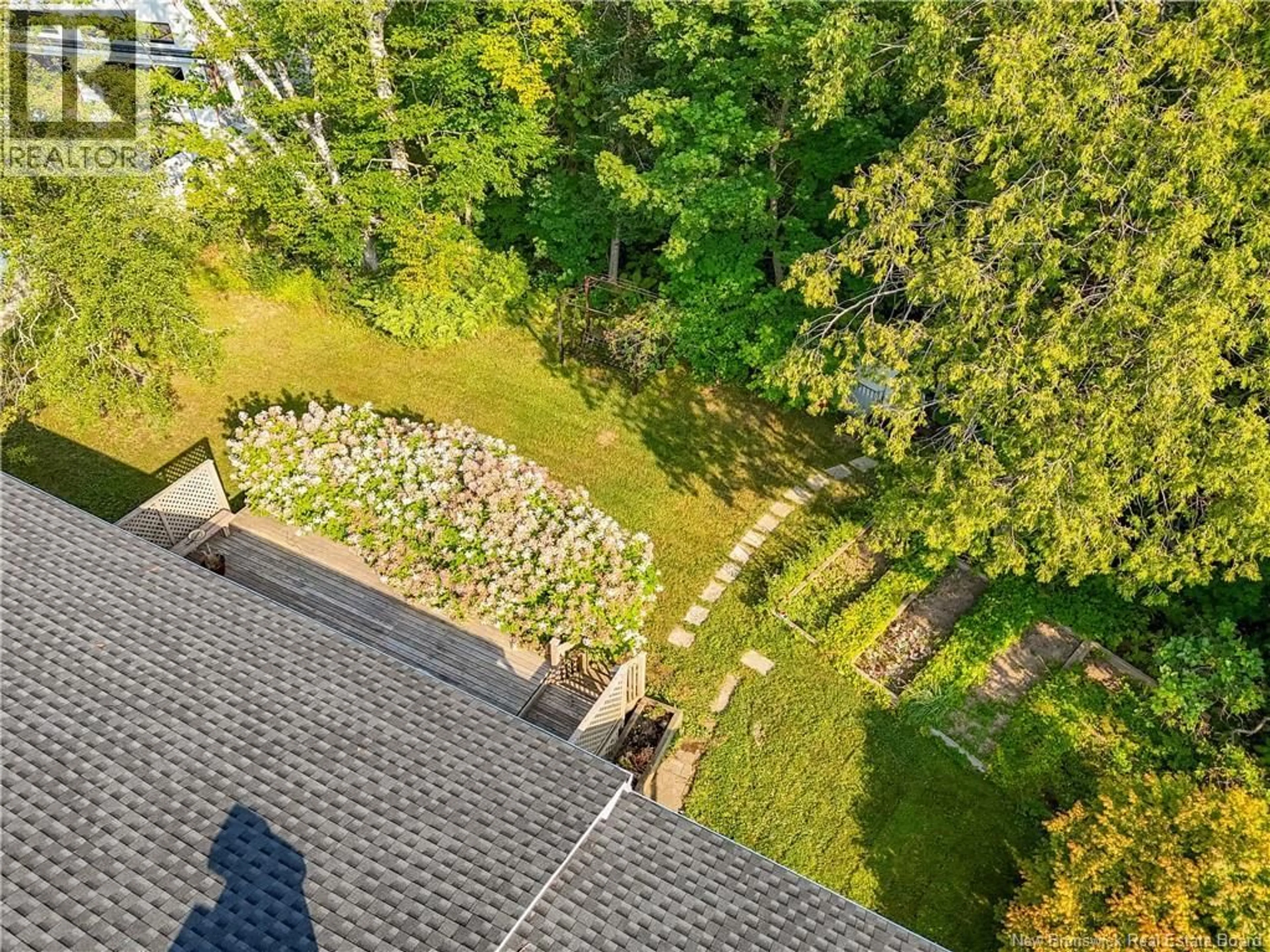A pic from outside/outdoor area/front of a property/back of a property/a pic from drone, forest/trees view for 25 SIMCOE COURT, Fredericton New Brunswick E3B2W9