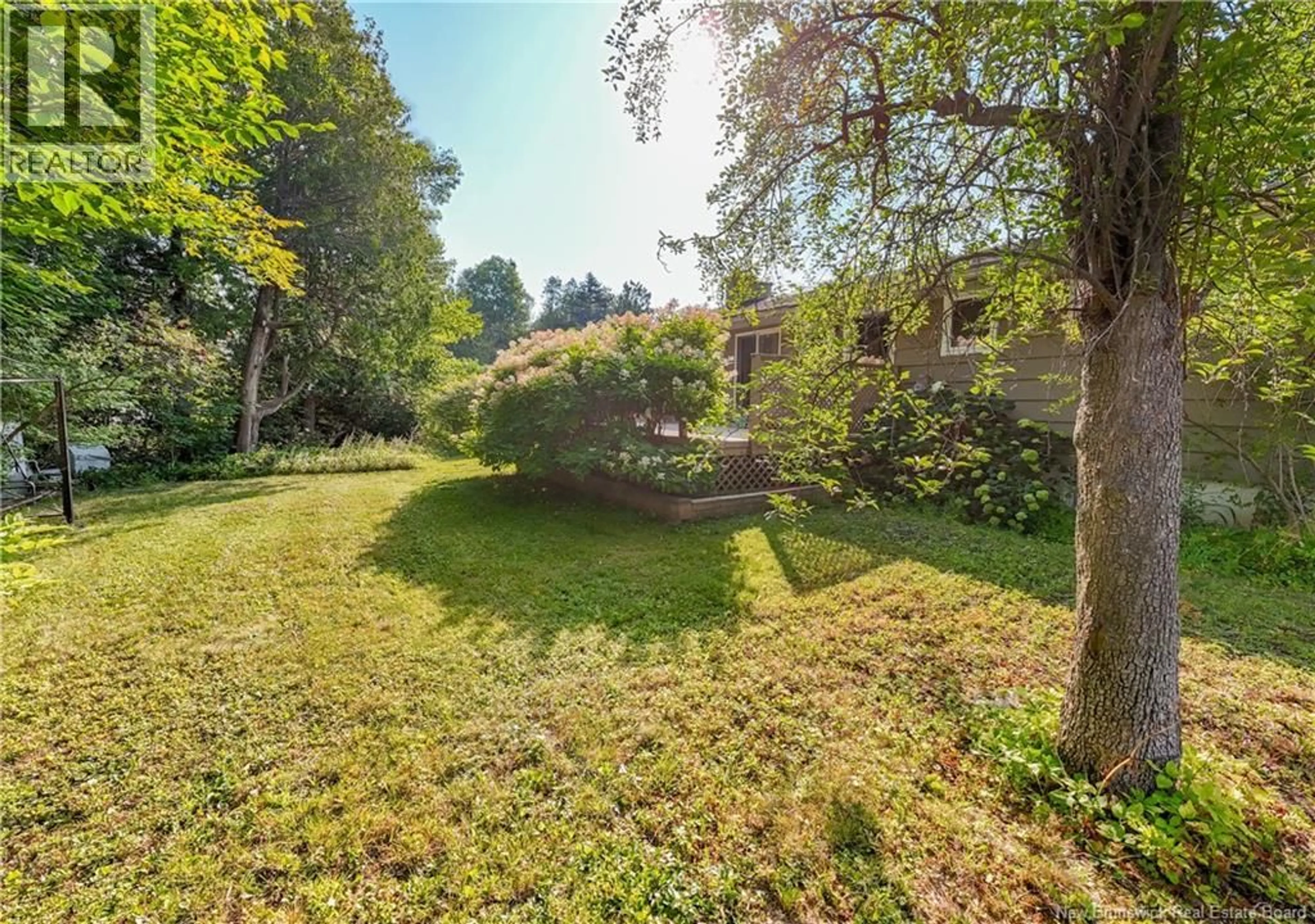 A pic from outside/outdoor area/front of a property/back of a property/a pic from drone, forest/trees view for 25 SIMCOE COURT, Fredericton New Brunswick E3B2W9