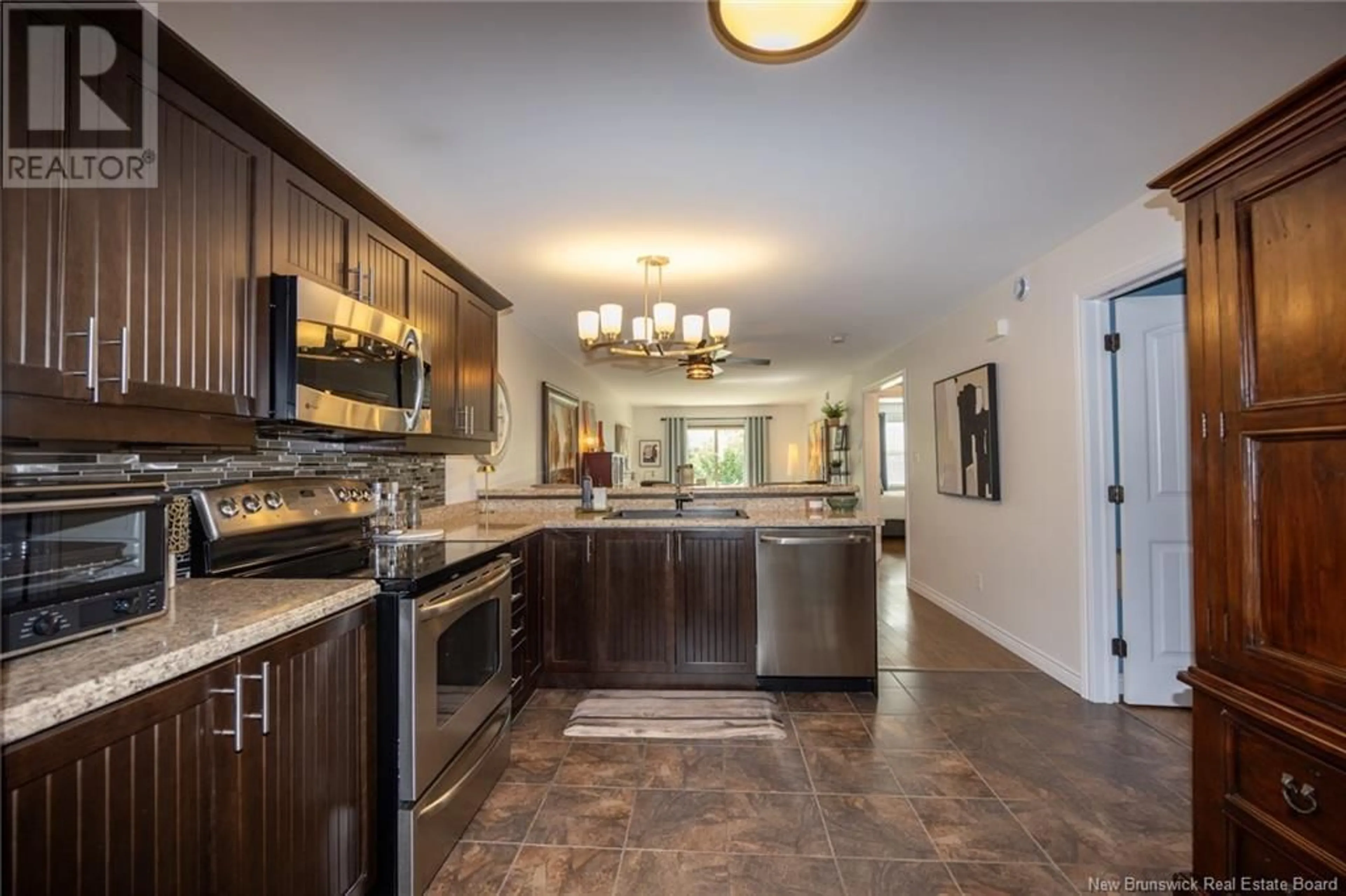 Open concept kitchen, ceramic/tile floor for 35 - 20 TRAILSIDE LANE, Fredericton New Brunswick E3A1R7