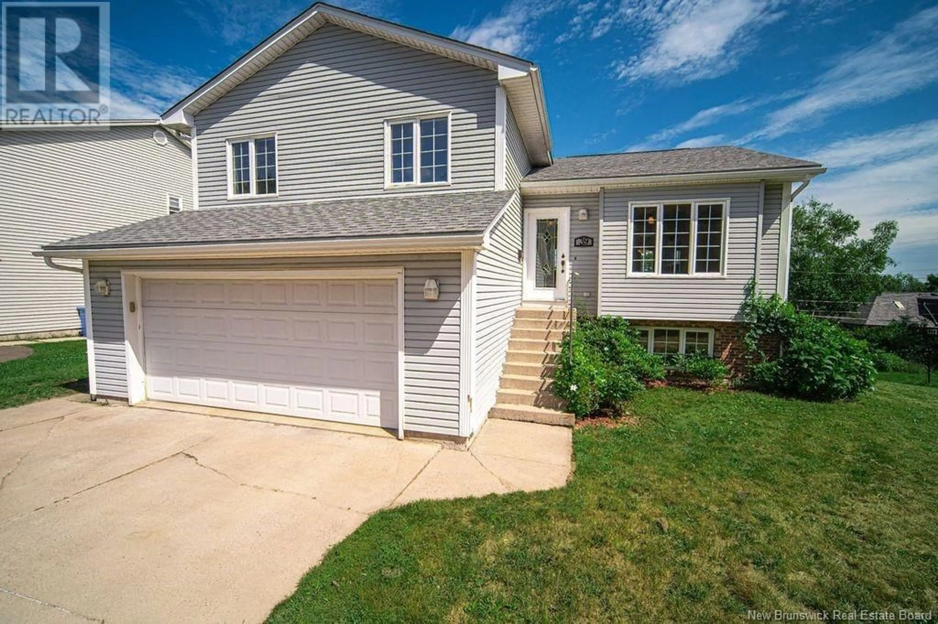 Home with vinyl exterior material, street for 39 AMBERWOOD LANE, Fredericton New Brunswick E3C1L7