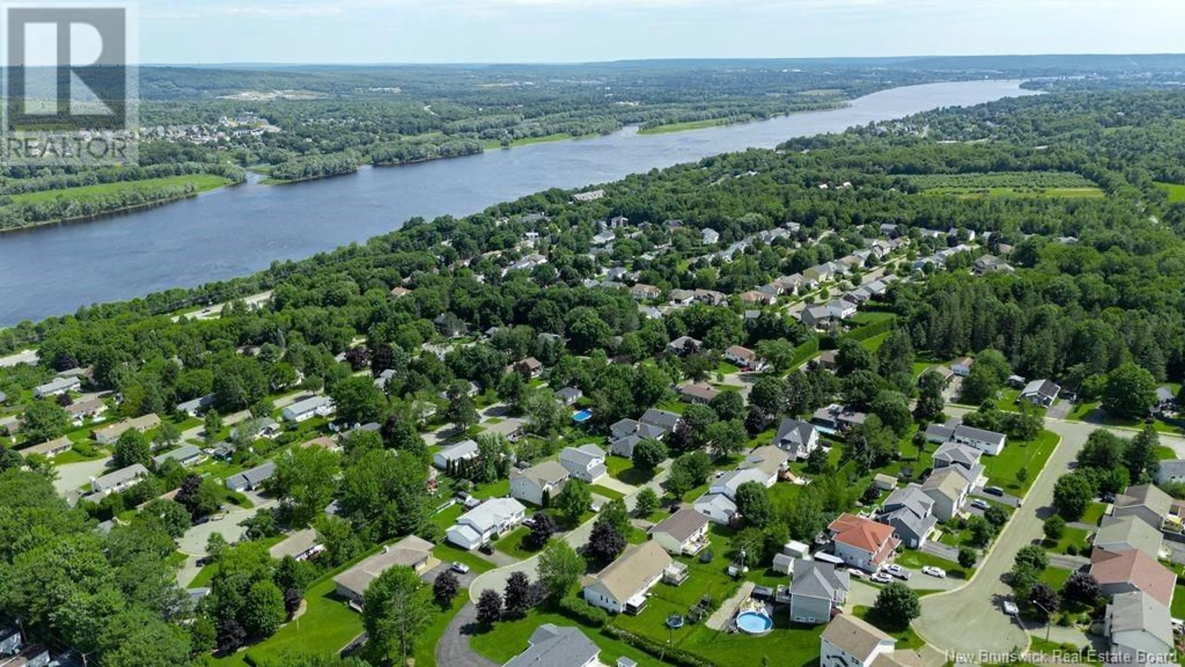 A pic from outside/outdoor area/front of a property/back of a property/a pic from drone, water/lake/river/ocean view for 39 AMBERWOOD LANE, Fredericton New Brunswick E3C1L7