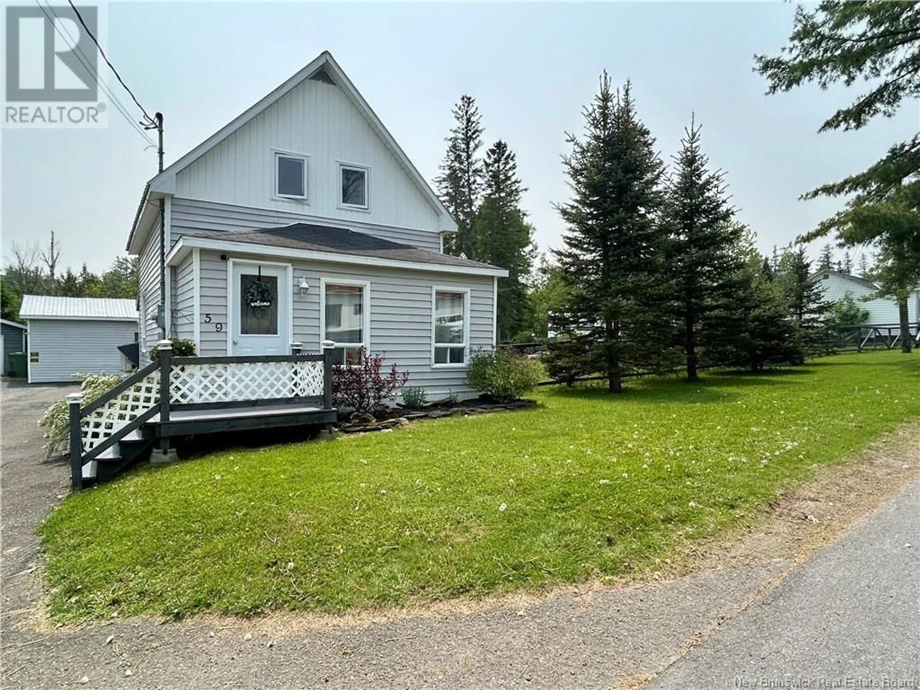 Home with vinyl exterior material, street for 59-61 POST STREET, Plaster Rock New Brunswick E7G2M7
