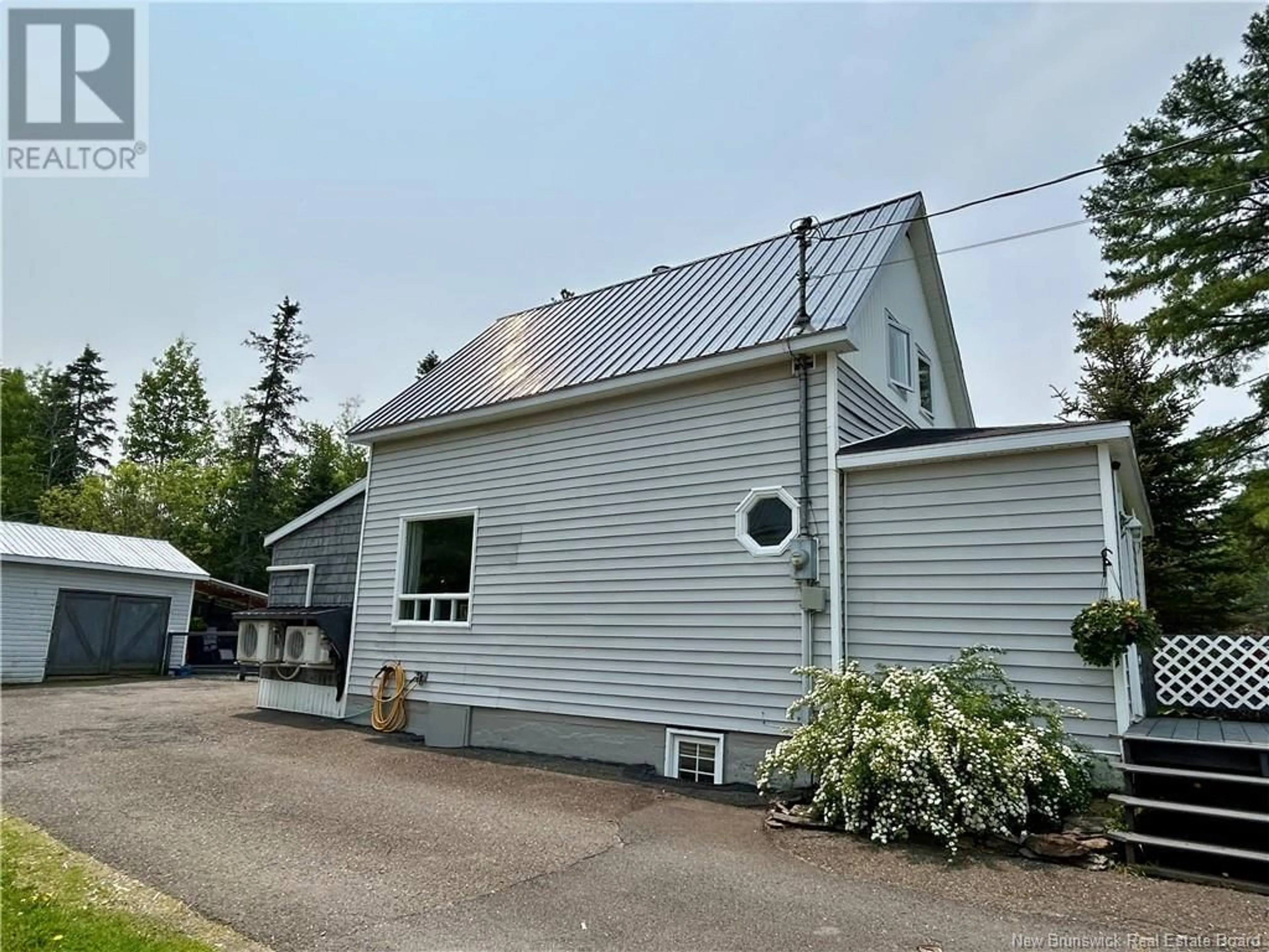 A pic from outside/outdoor area/front of a property/back of a property/a pic from drone, street for 59-61 POST STREET, Plaster Rock New Brunswick E7G2M7
