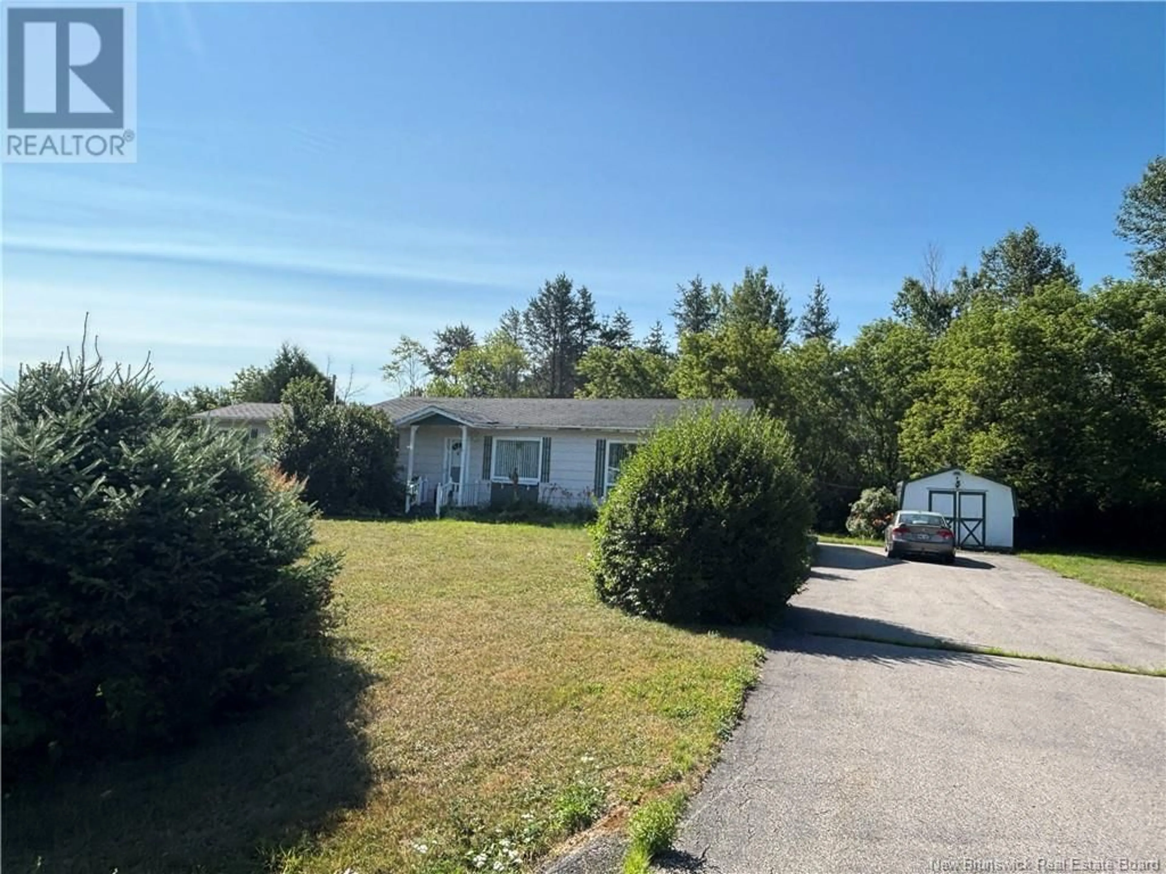 A pic from outside/outdoor area/front of a property/back of a property/a pic from drone, unknown for 16 RUE BERTIN, Sainte-Anne New Brunswick E2A7B2
