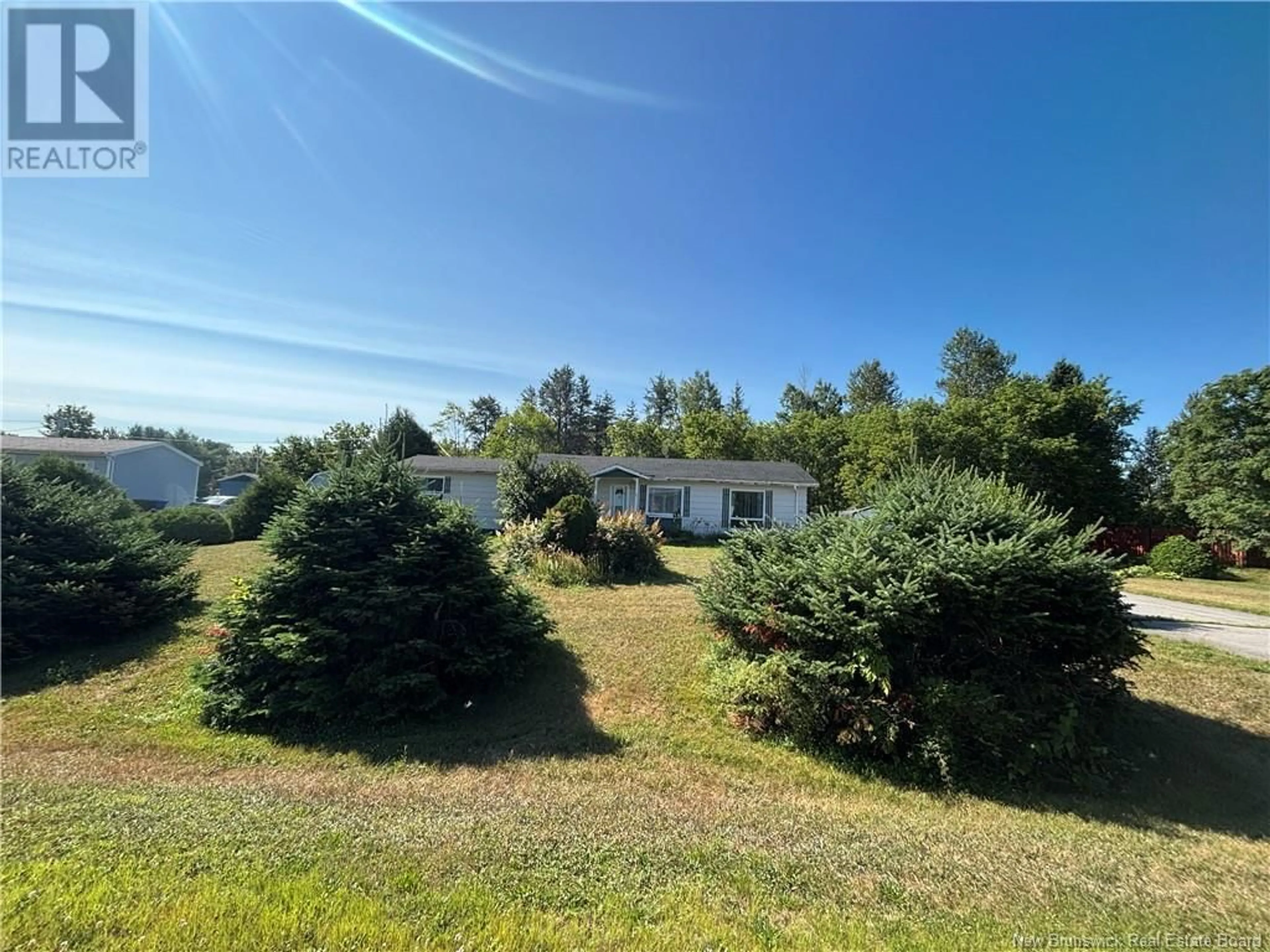 A pic from outside/outdoor area/front of a property/back of a property/a pic from drone, forest/trees view for 16 RUE BERTIN, Sainte-Anne New Brunswick E2A7B2