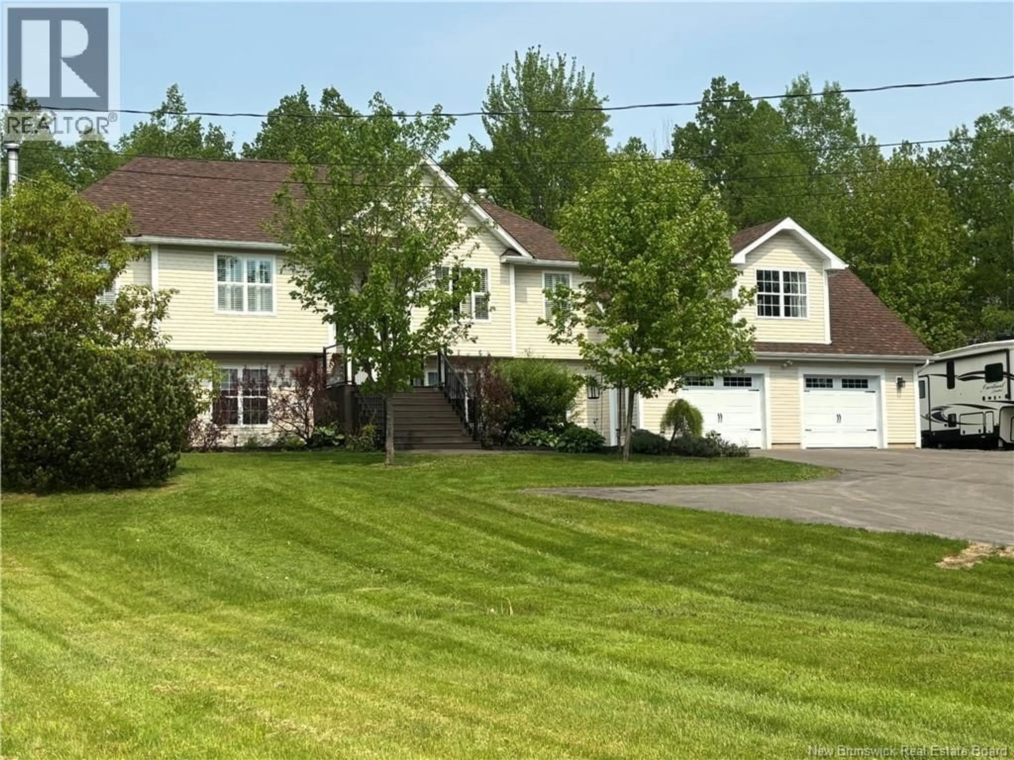 Home with vinyl exterior material, street for 21 ROGERS, Berry Mills New Brunswick E1G2N2