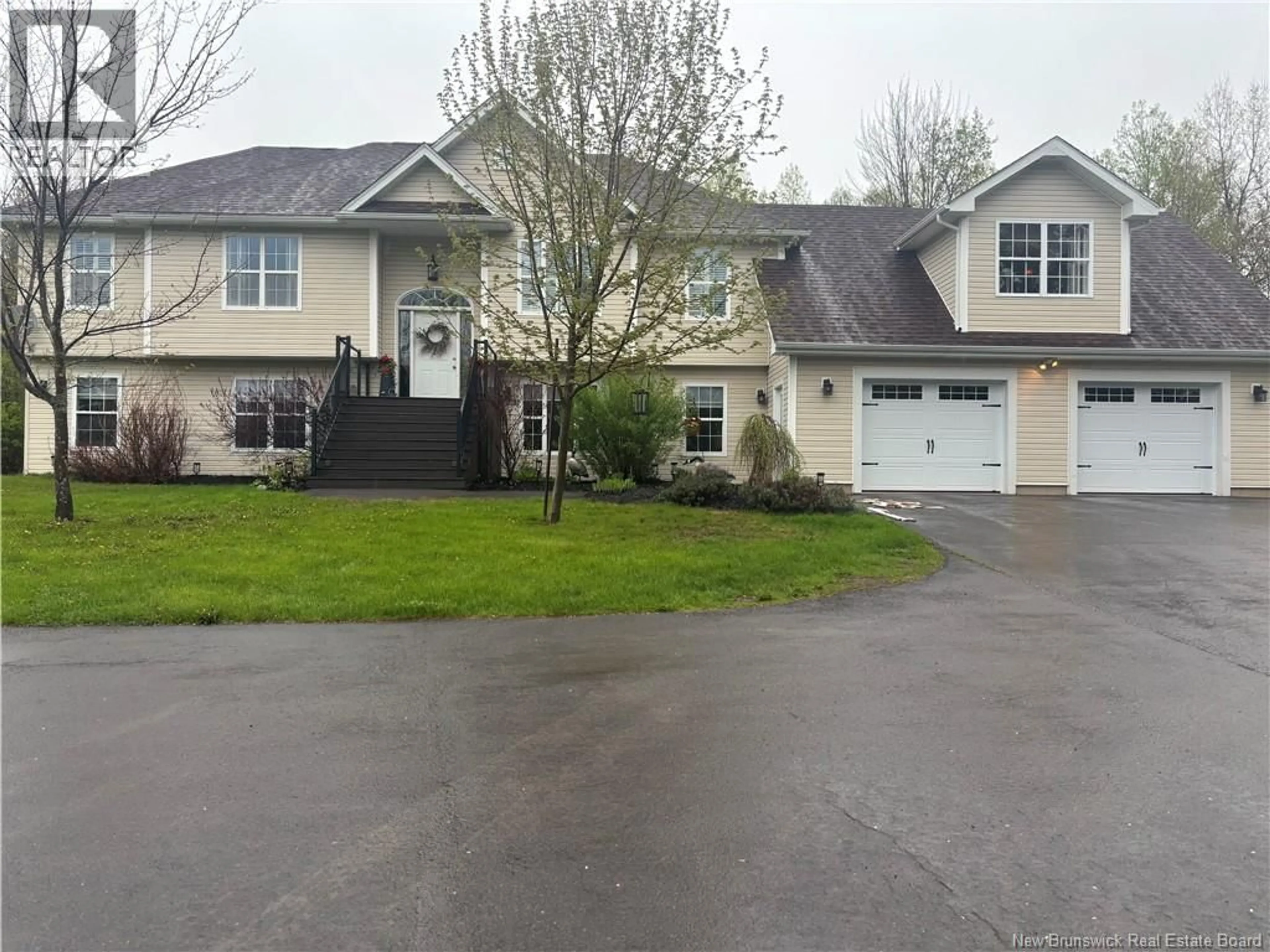 Home with vinyl exterior material, street for 21 ROGERS, Berry Mills New Brunswick E1G2N2