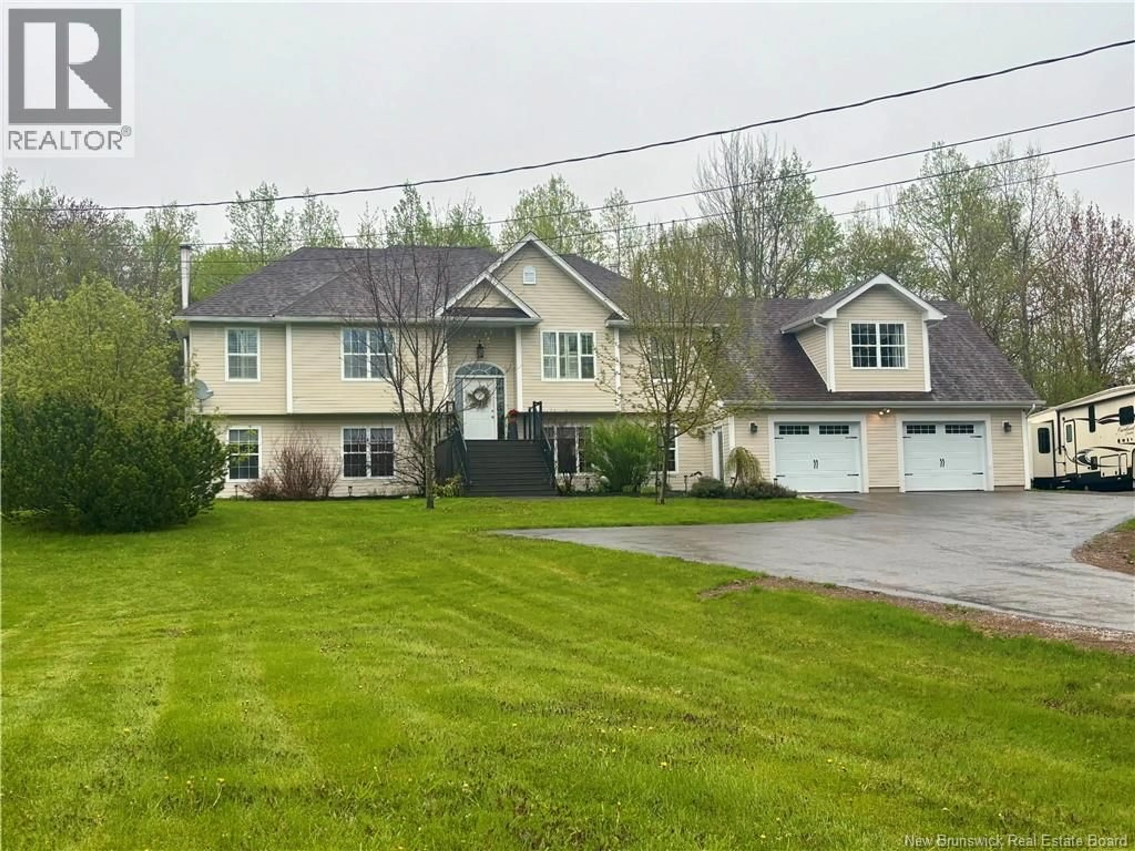 A pic from outside/outdoor area/front of a property/back of a property/a pic from drone, street for 21 ROGERS, Berry Mills New Brunswick E1G2N2