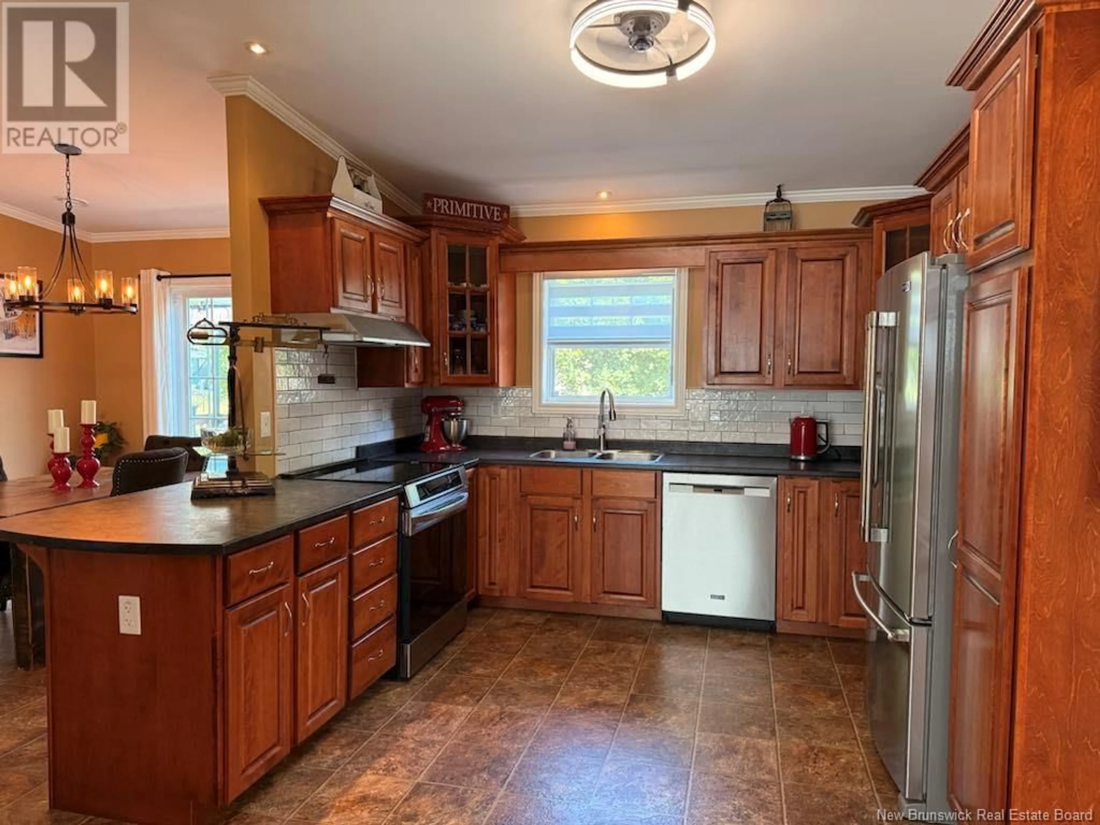 Open concept kitchen, ceramic/tile floor for 16 DINAN STREET, Miramichi New Brunswick E1V0B5