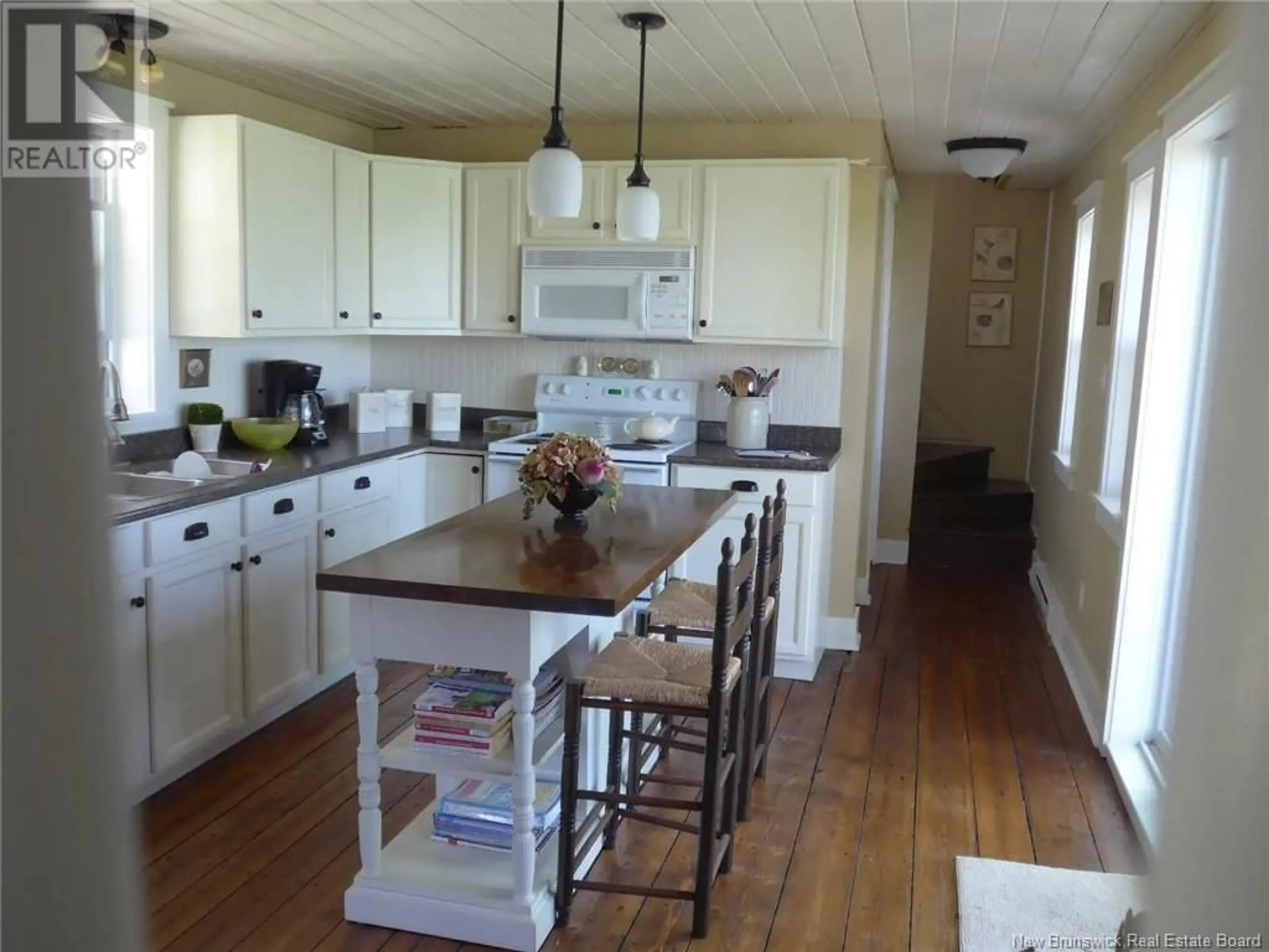 Open concept kitchen, wood/laminate floor for 45 ARMSTRONG WHARF ROAD, Codys New Brunswick E4C6B4