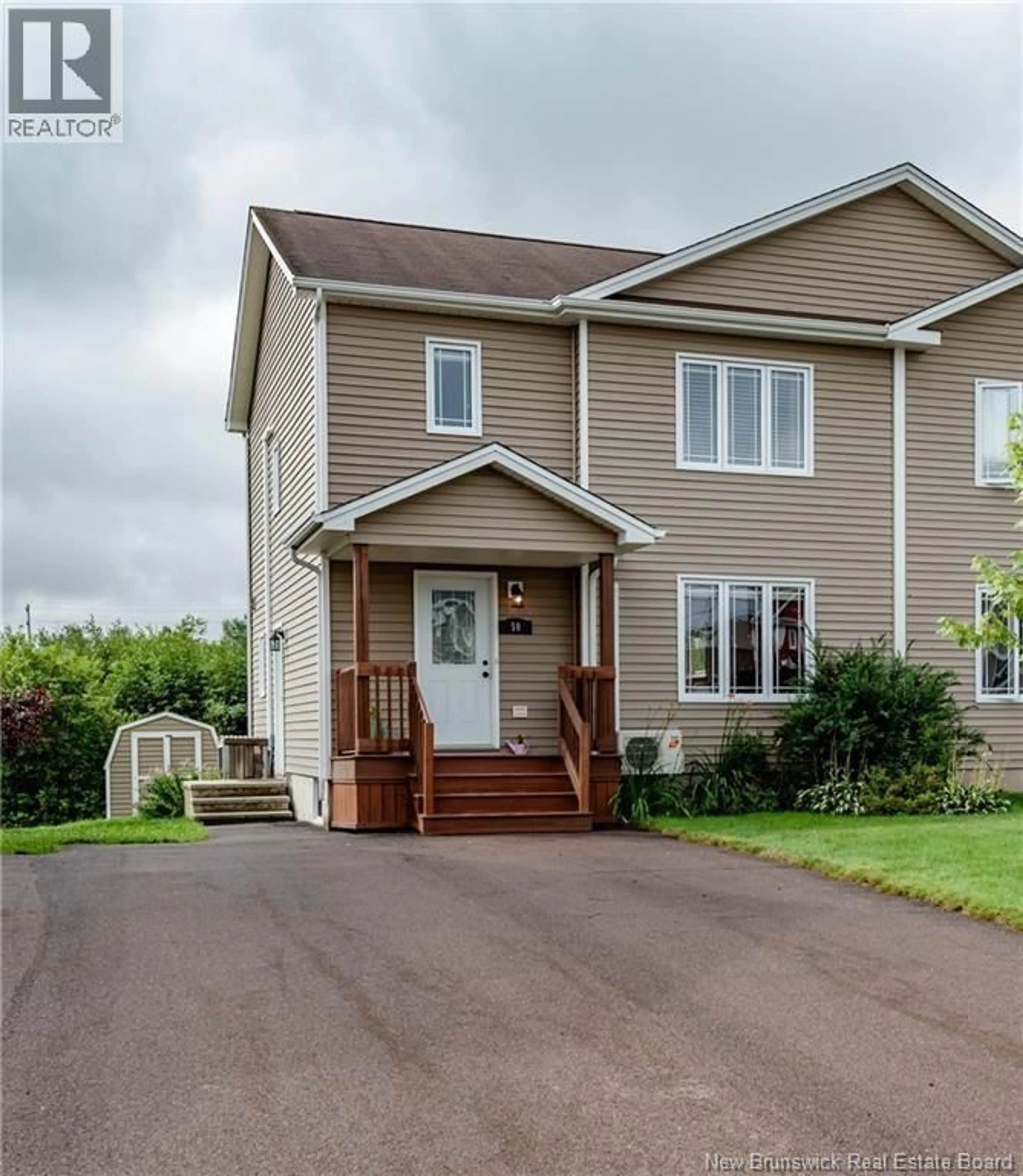 Home with vinyl exterior material, street for 50 NUGENT STREET, Dieppe New Brunswick E1A0S6