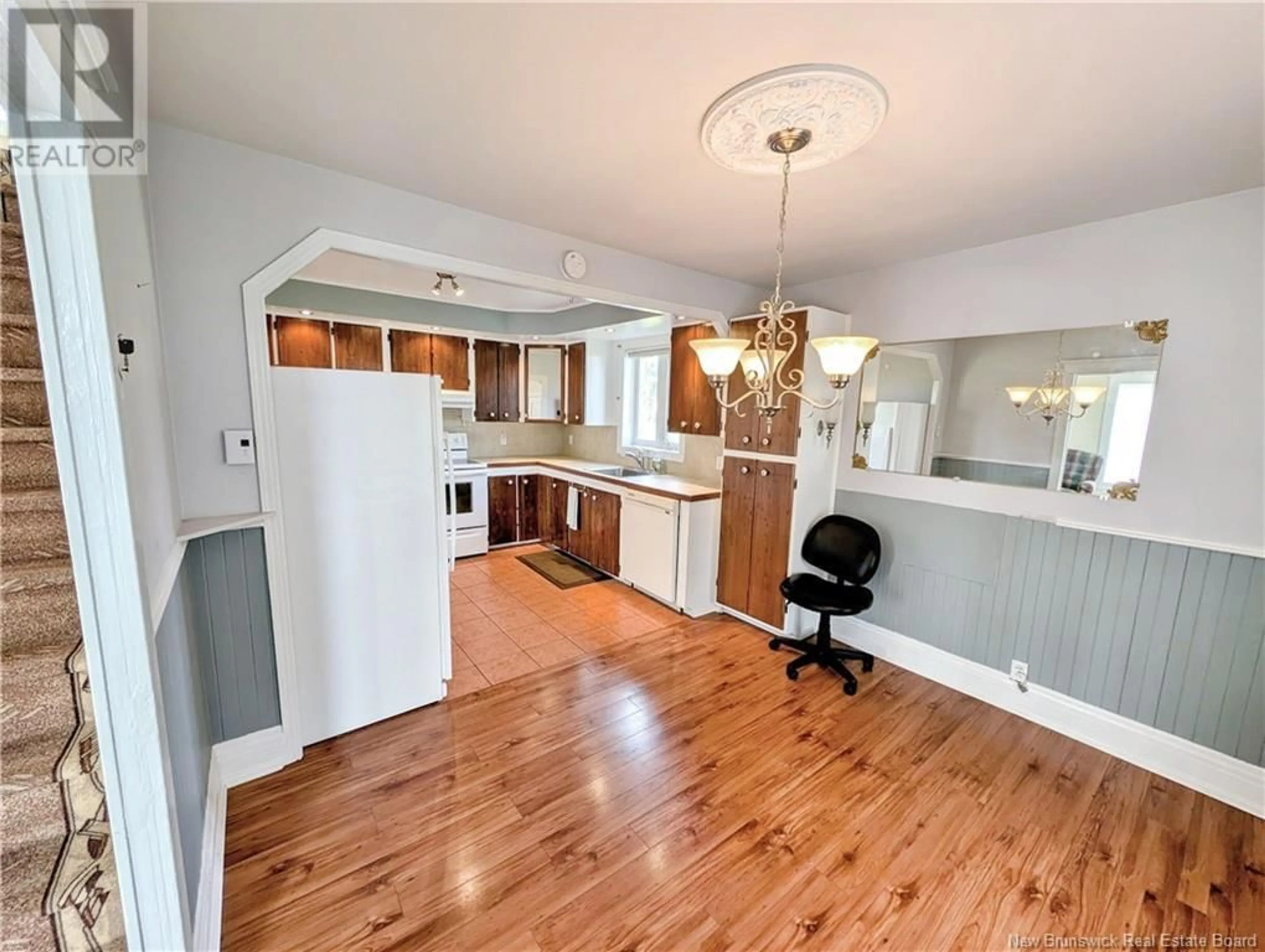 Open concept kitchen, wood/laminate floor for 7761 RUE SAINT-PAUL, Bas-Caraquet New Brunswick E1W6C1