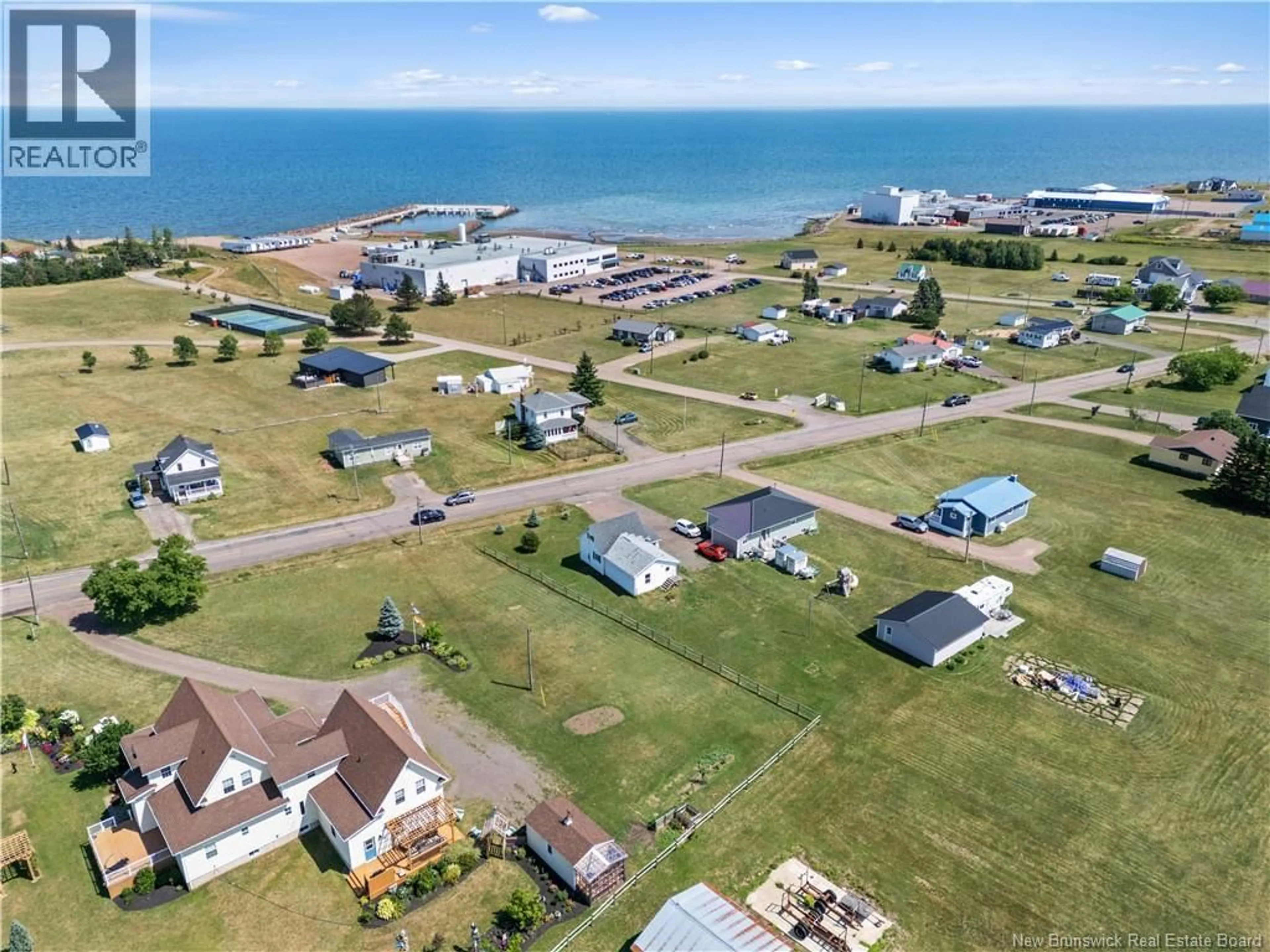 A pic from outside/outdoor area/front of a property/back of a property/a pic from drone, water/lake/river/ocean view for 797 BAS-CAP-PELE ROAD, Cap-Pelé New Brunswick E4N1M1