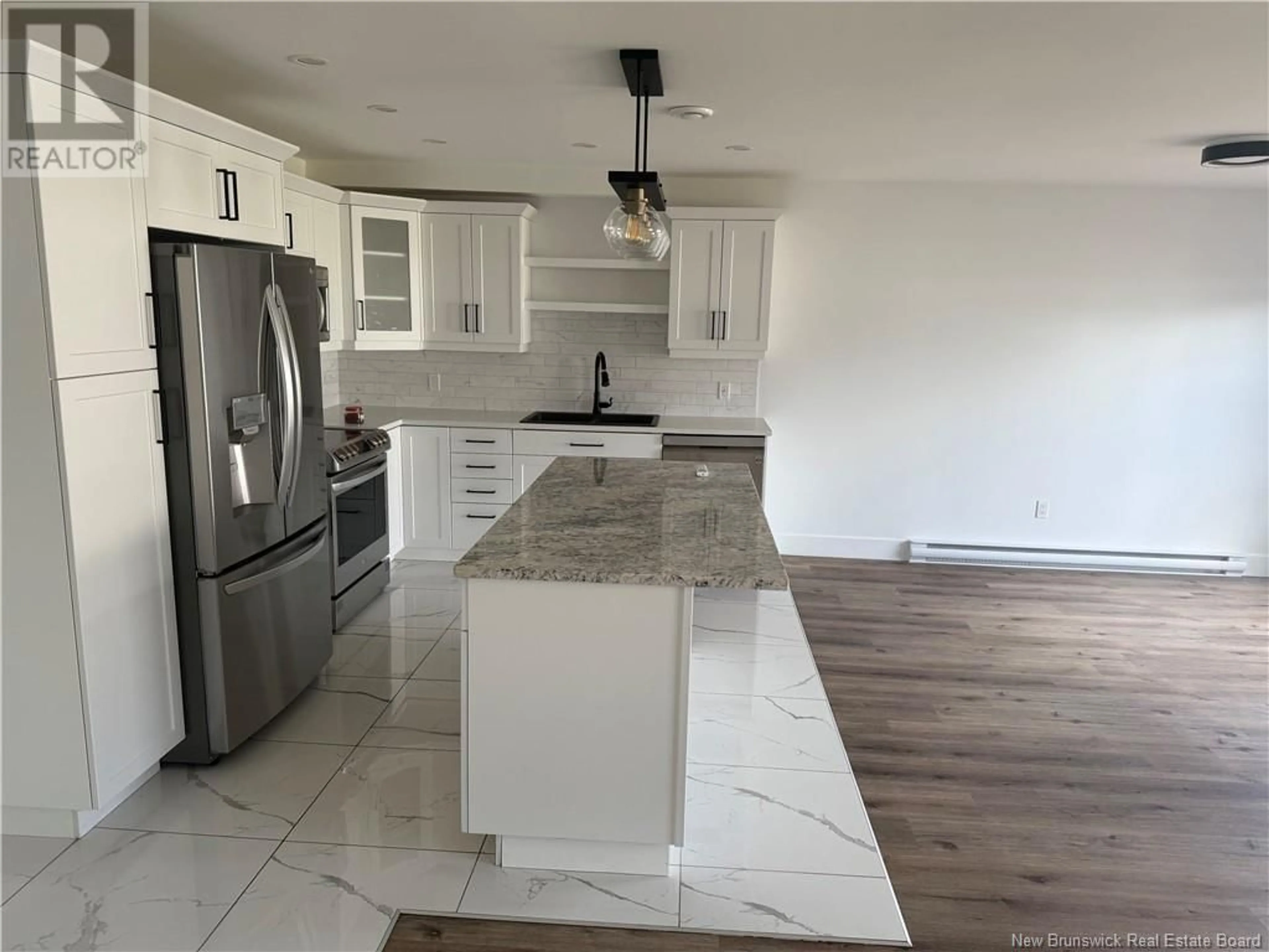 Open concept kitchen, ceramic/tile floor for 75 WARNER STREET, Moncton New Brunswick E1A5T3