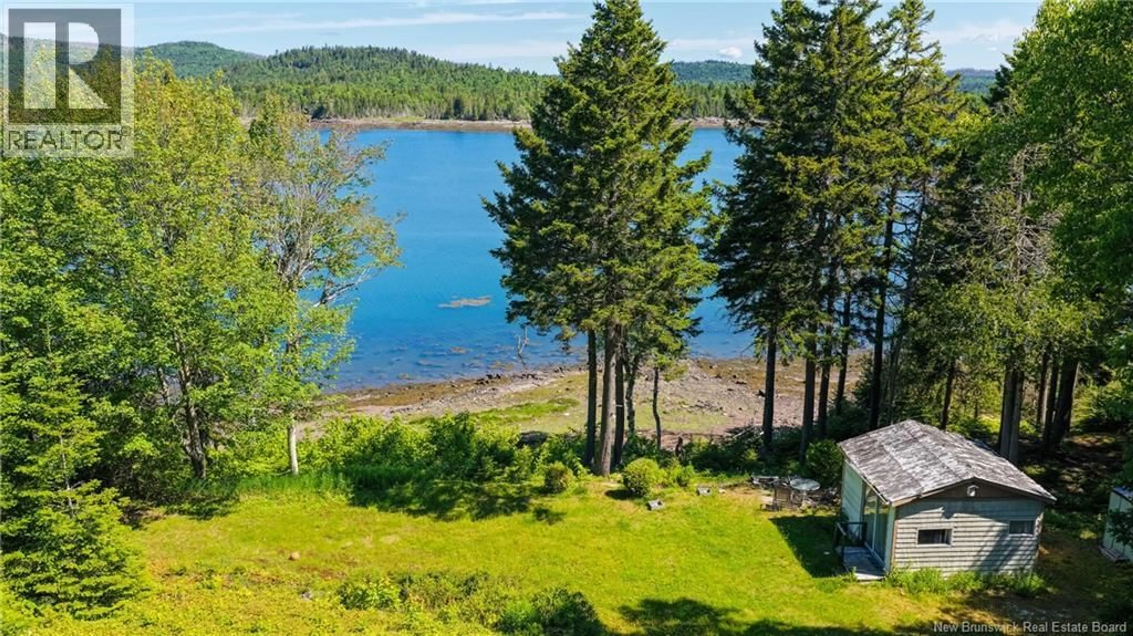 A pic from outside/outdoor area/front of a property/back of a property/a pic from drone, water/lake/river/ocean view for 23 BIRCH COVE VIEW, Chamcook New Brunswick E5B3E1