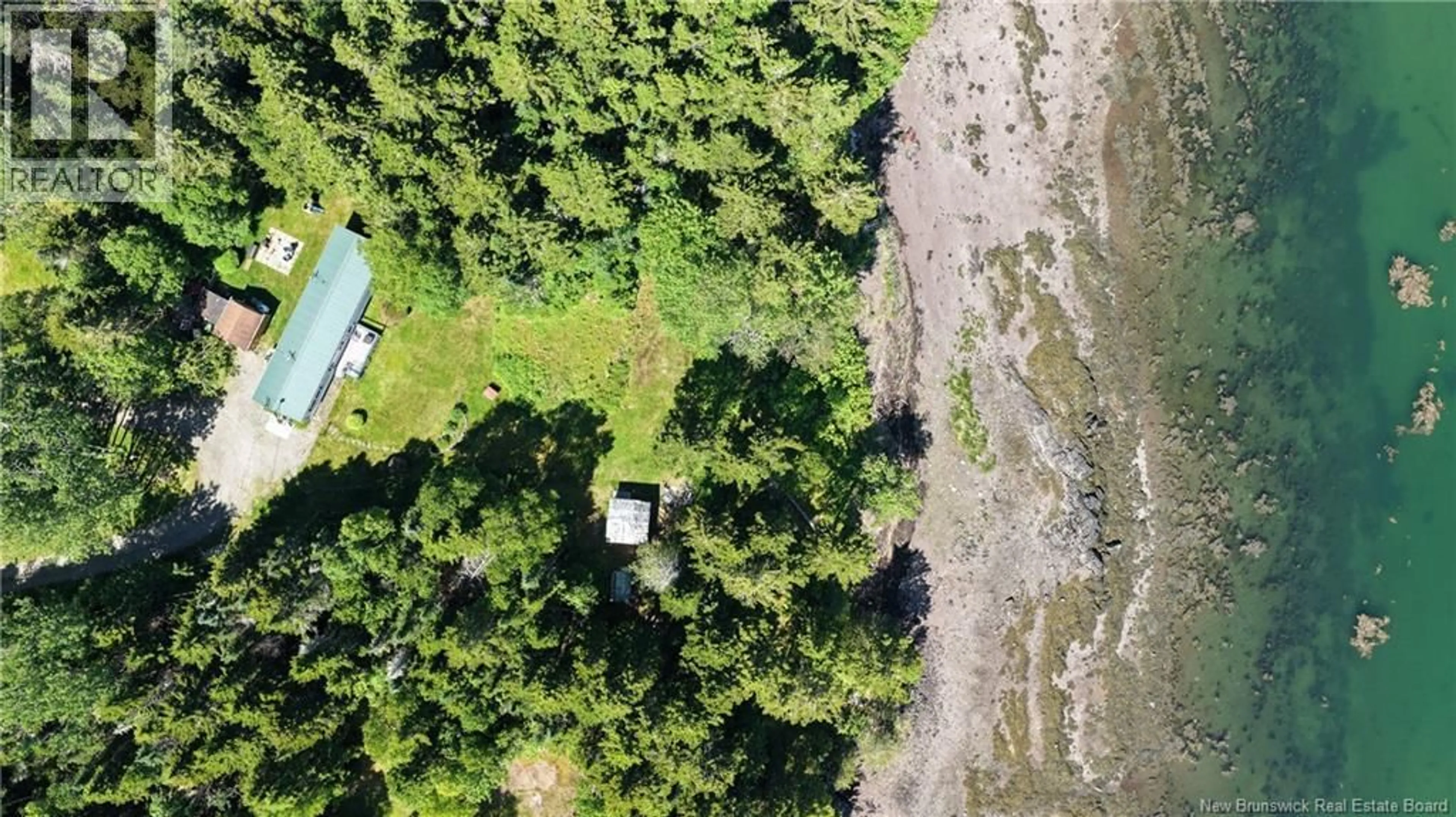 A pic from outside/outdoor area/front of a property/back of a property/a pic from drone, forest/trees view for 23 BIRCH COVE VIEW, Chamcook New Brunswick E5B3E1