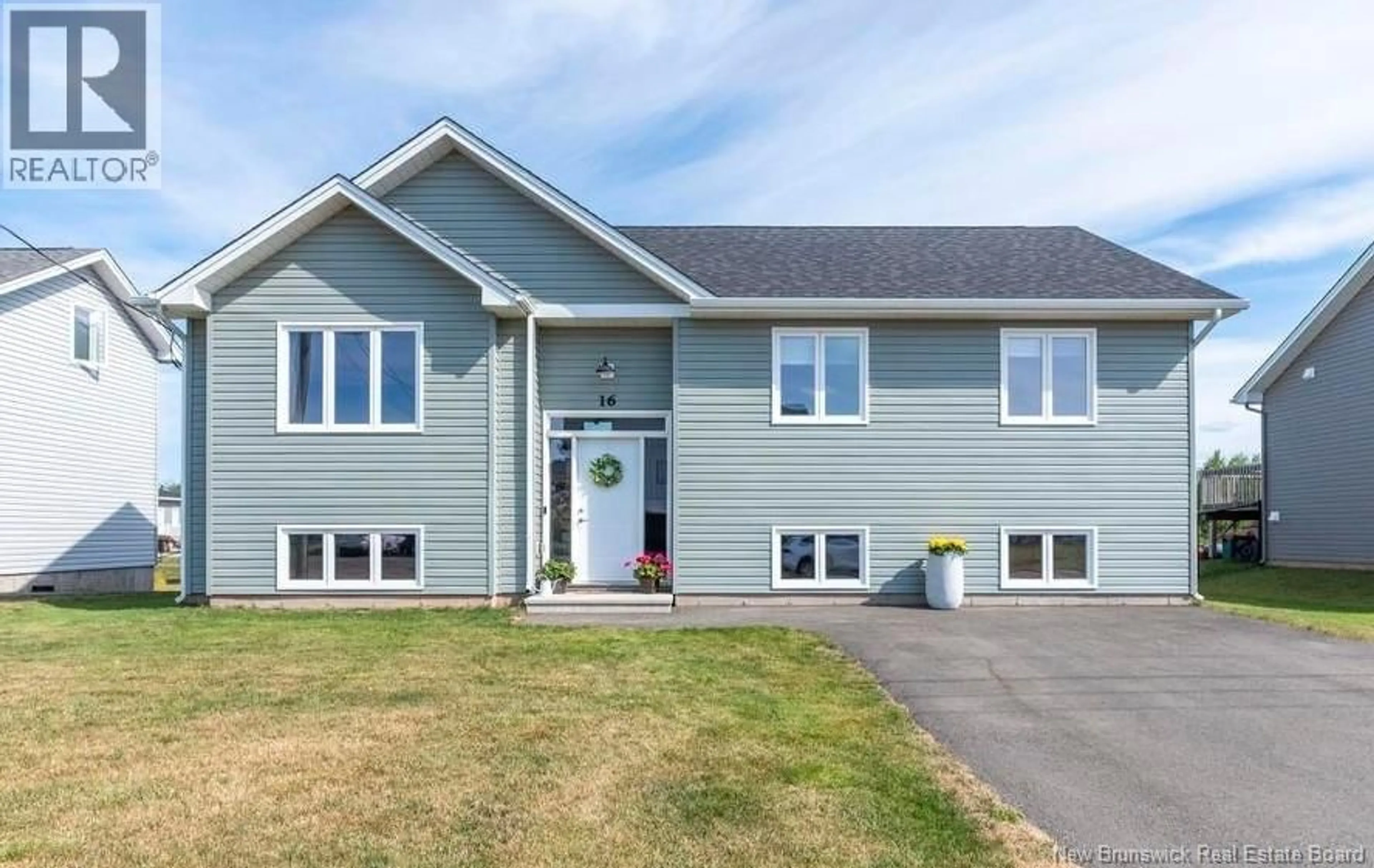 Home with vinyl exterior material, street for 16 LUXOR DRIVE, Riverview New Brunswick E1B0V8