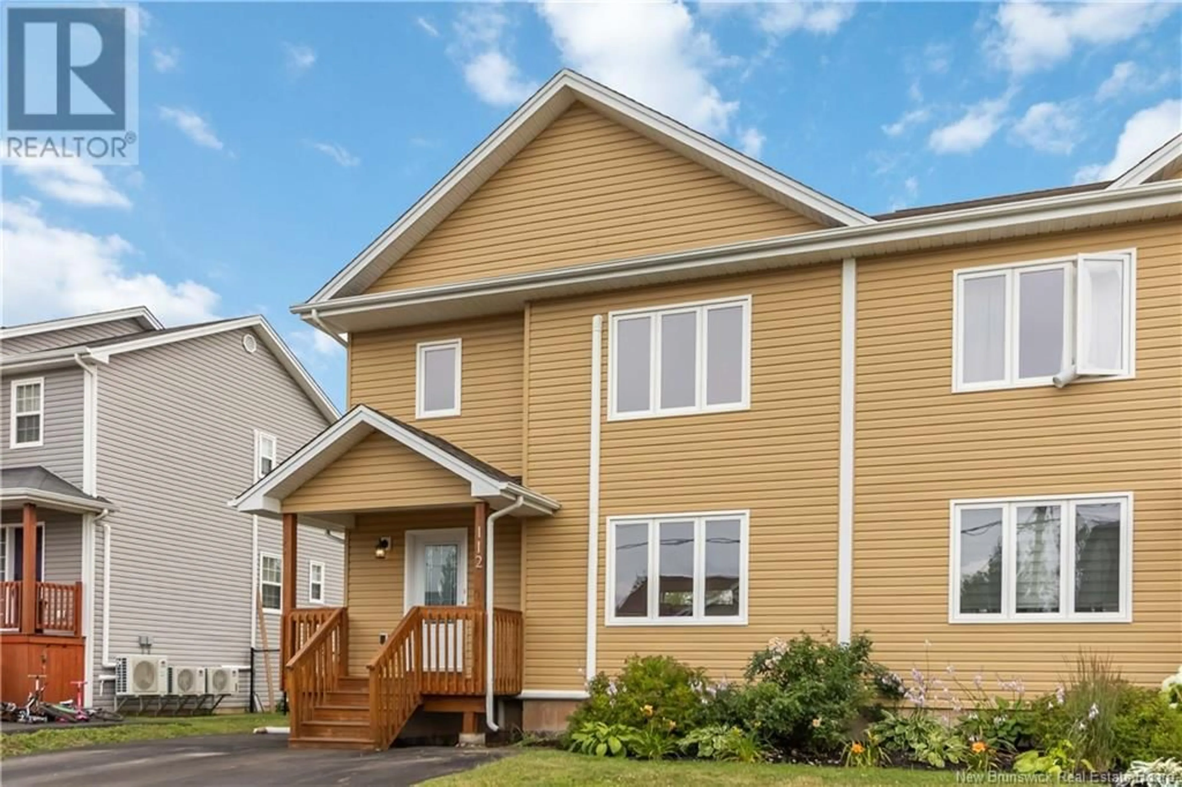 Home with vinyl exterior material, street for 112 GAMBIA, Moncton New Brunswick E1G5T1