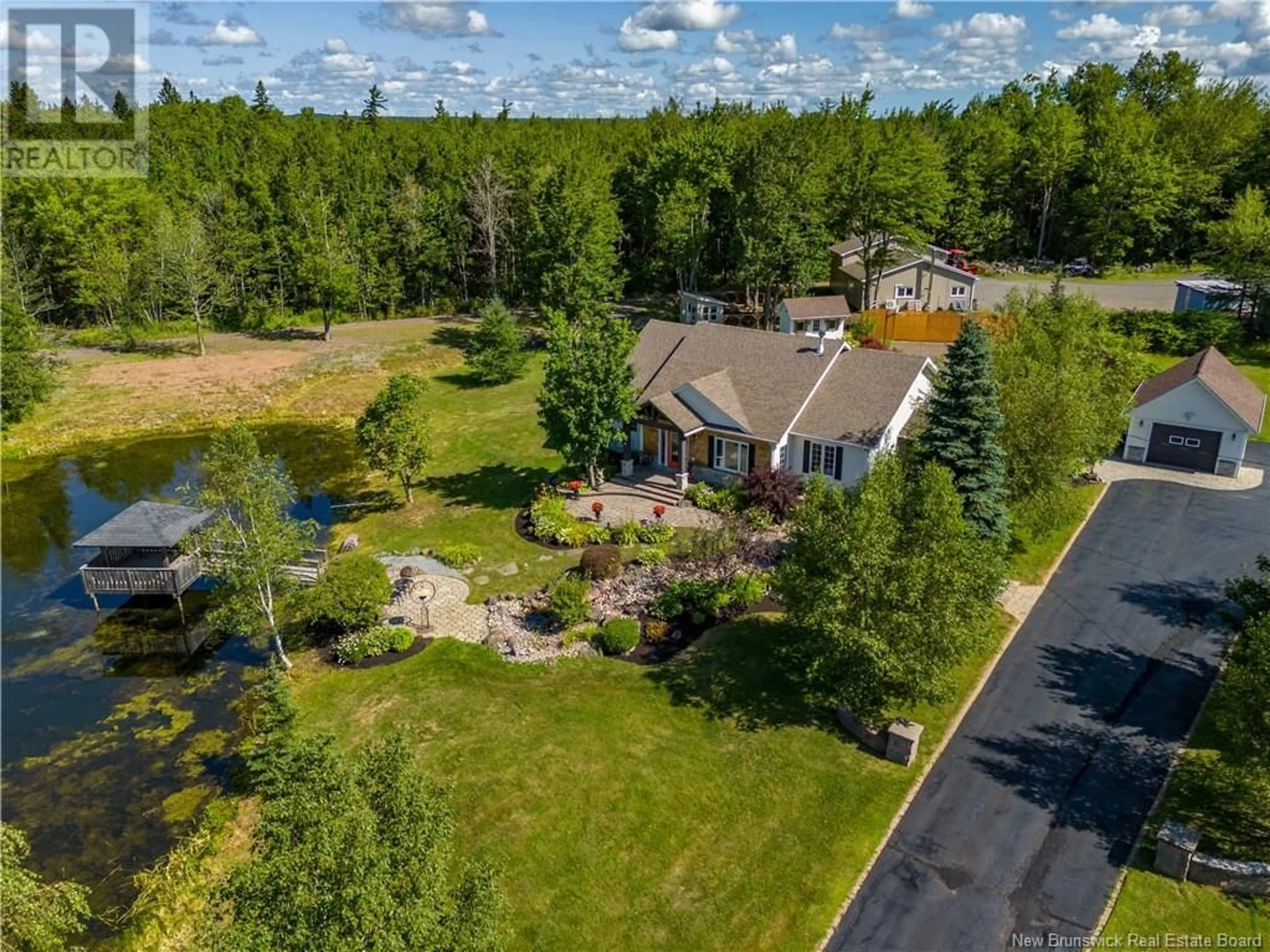 A pic from outside/outdoor area/front of a property/back of a property/a pic from drone, unknown for 26 MACARTHUR LANE, Irishtown New Brunswick E1H3K1