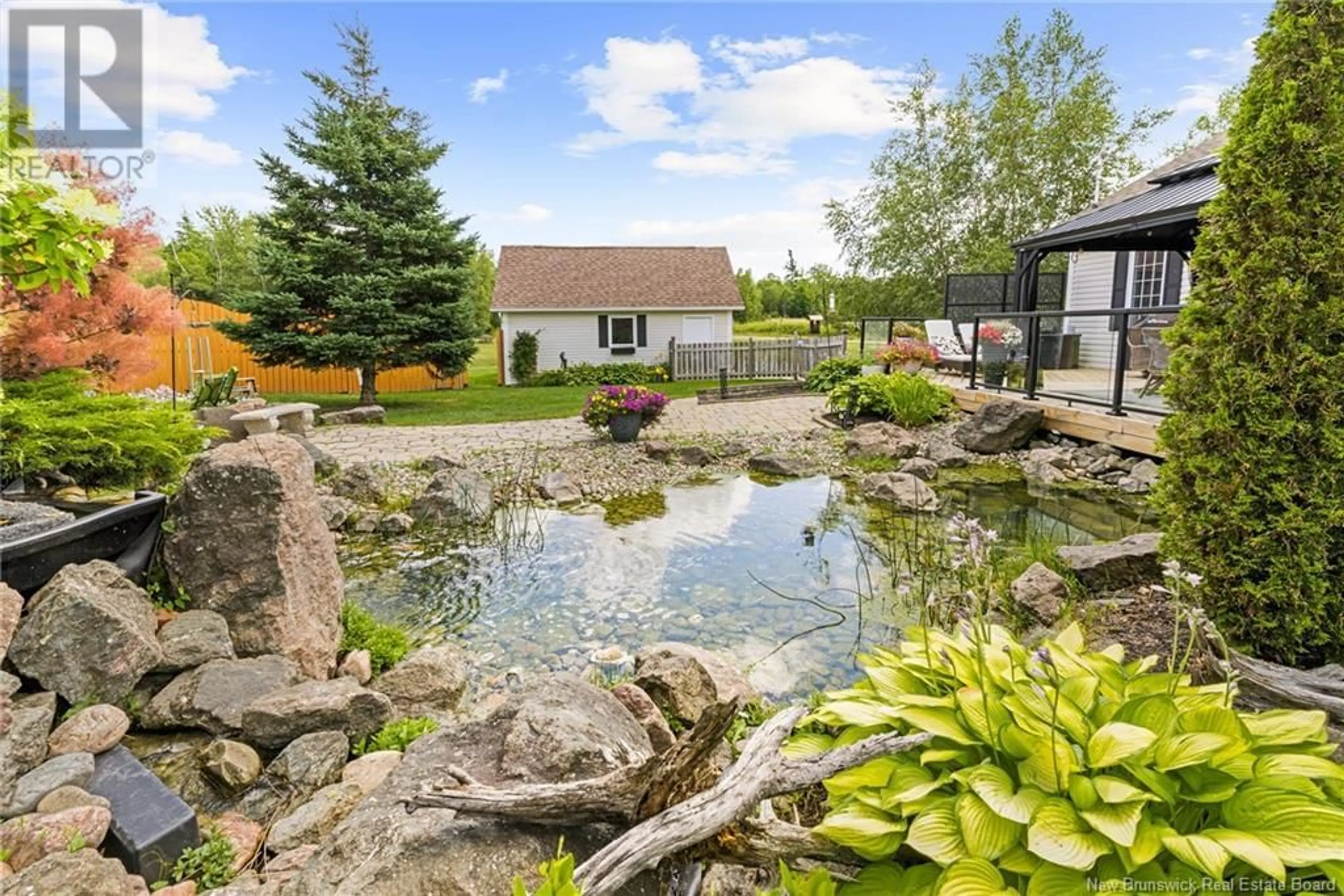 A pic from outside/outdoor area/front of a property/back of a property/a pic from drone, water/lake/river/ocean view for 26 MACARTHUR LANE, Irishtown New Brunswick E1H3K1