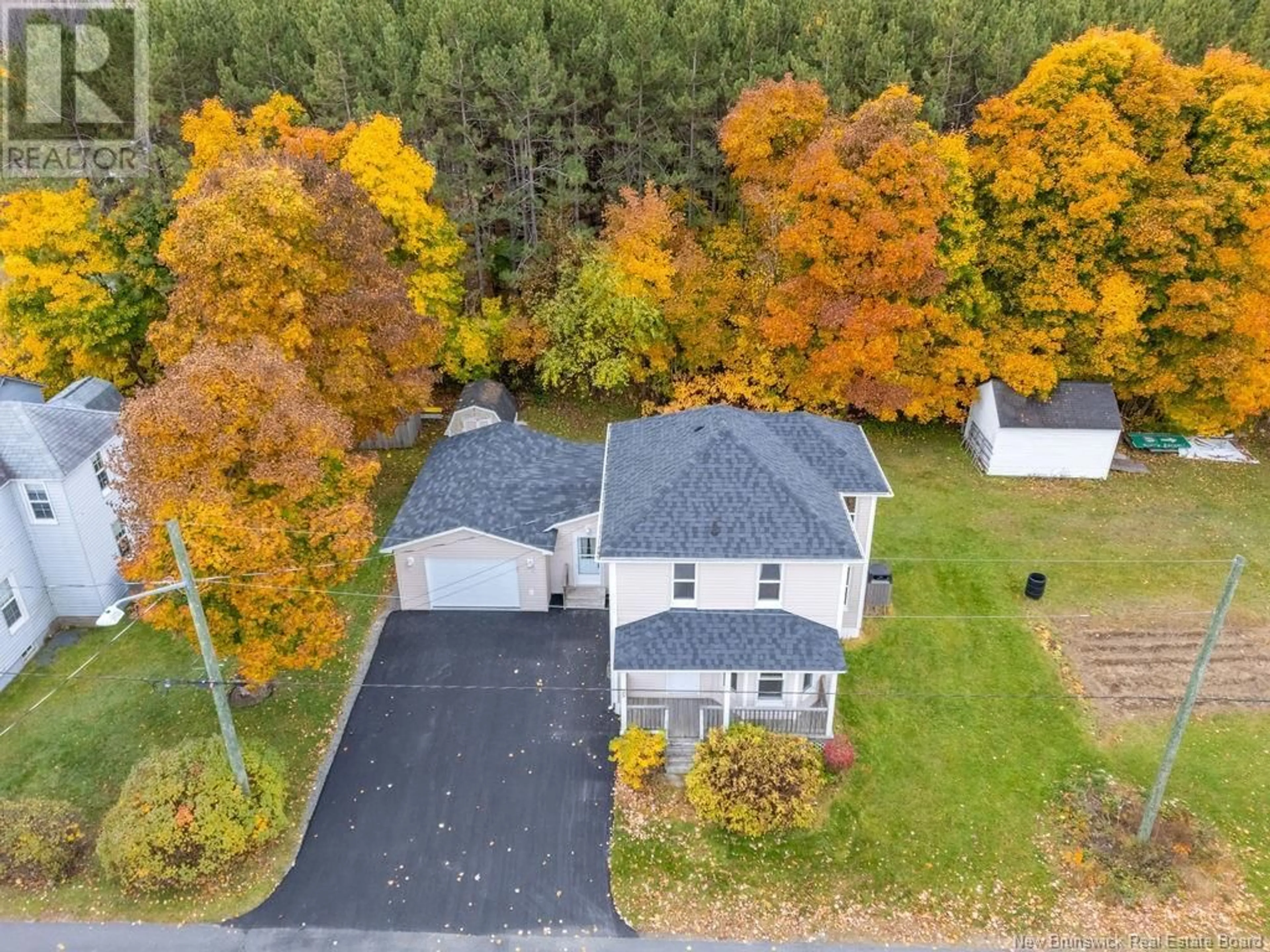 A pic from outside/outdoor area/front of a property/back of a property/a pic from drone, street for 25 KNOX STREET, Miramichi New Brunswick E1N4K1
