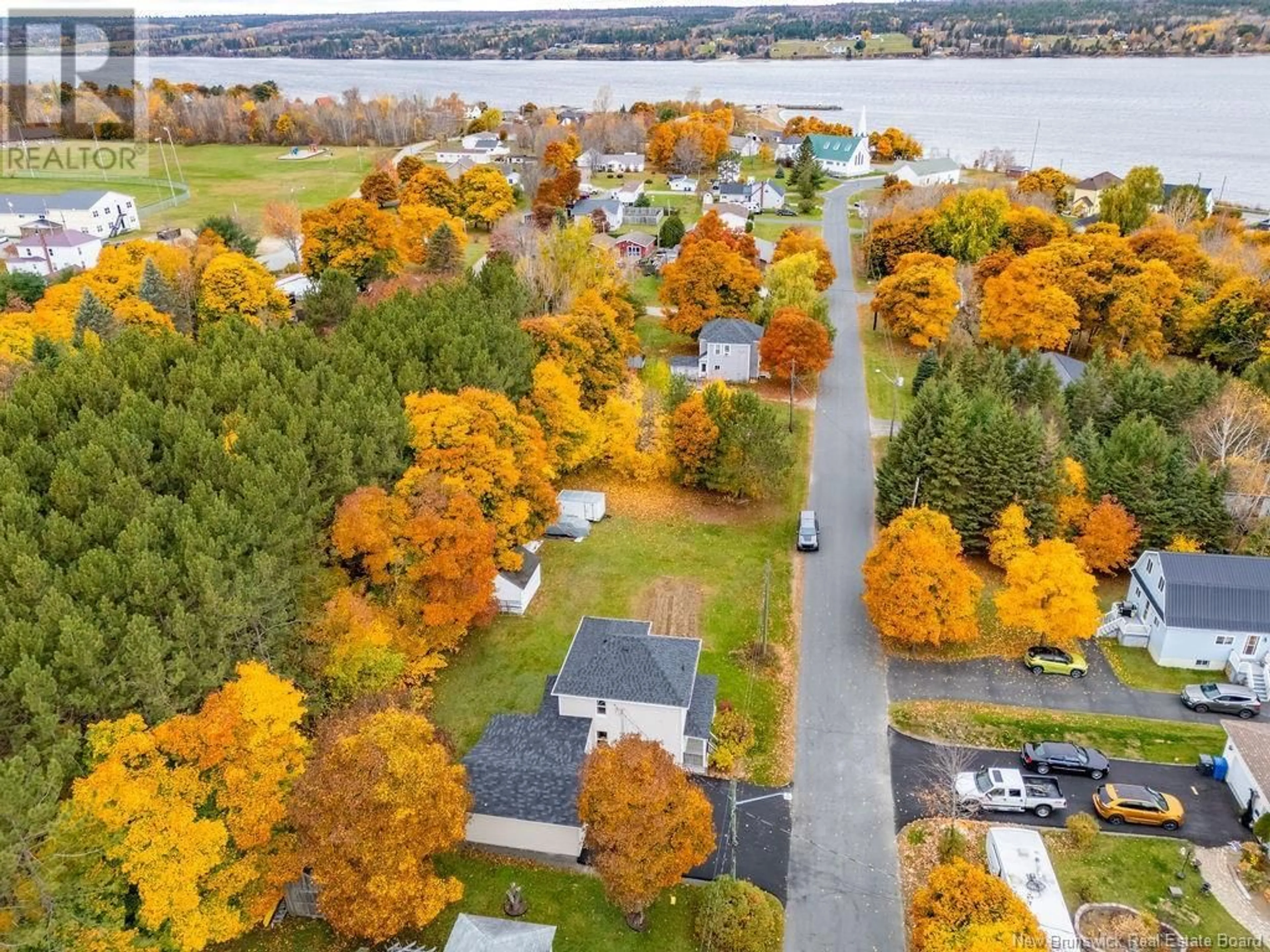 A pic from outside/outdoor area/front of a property/back of a property/a pic from drone, water/lake/river/ocean view for 25 KNOX STREET, Miramichi New Brunswick E1N4K1