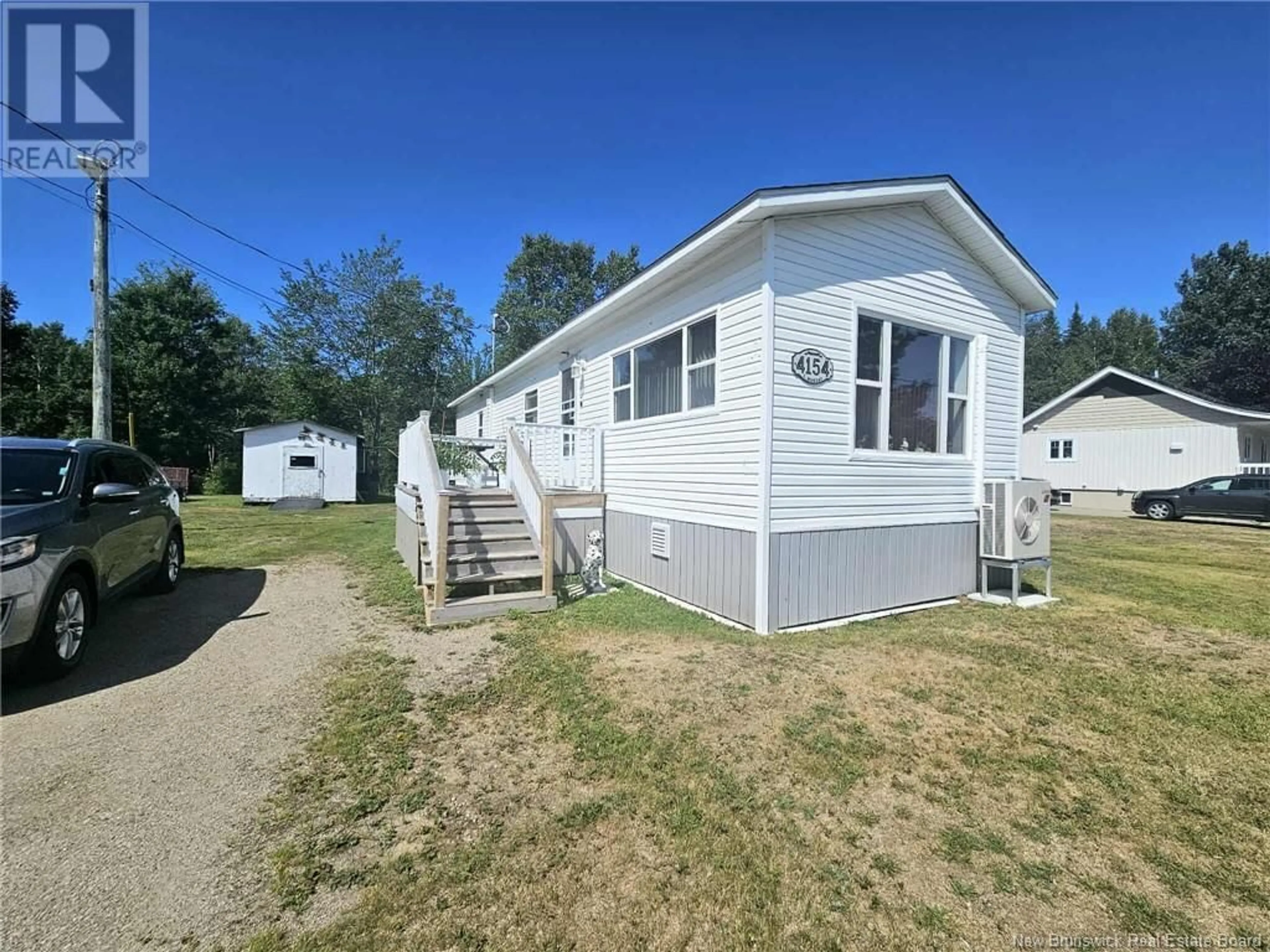 A pic from outside/outdoor area/front of a property/back of a property/a pic from drone, street for 4154 ROUTE 430, Big River New Brunswick E2A6W4
