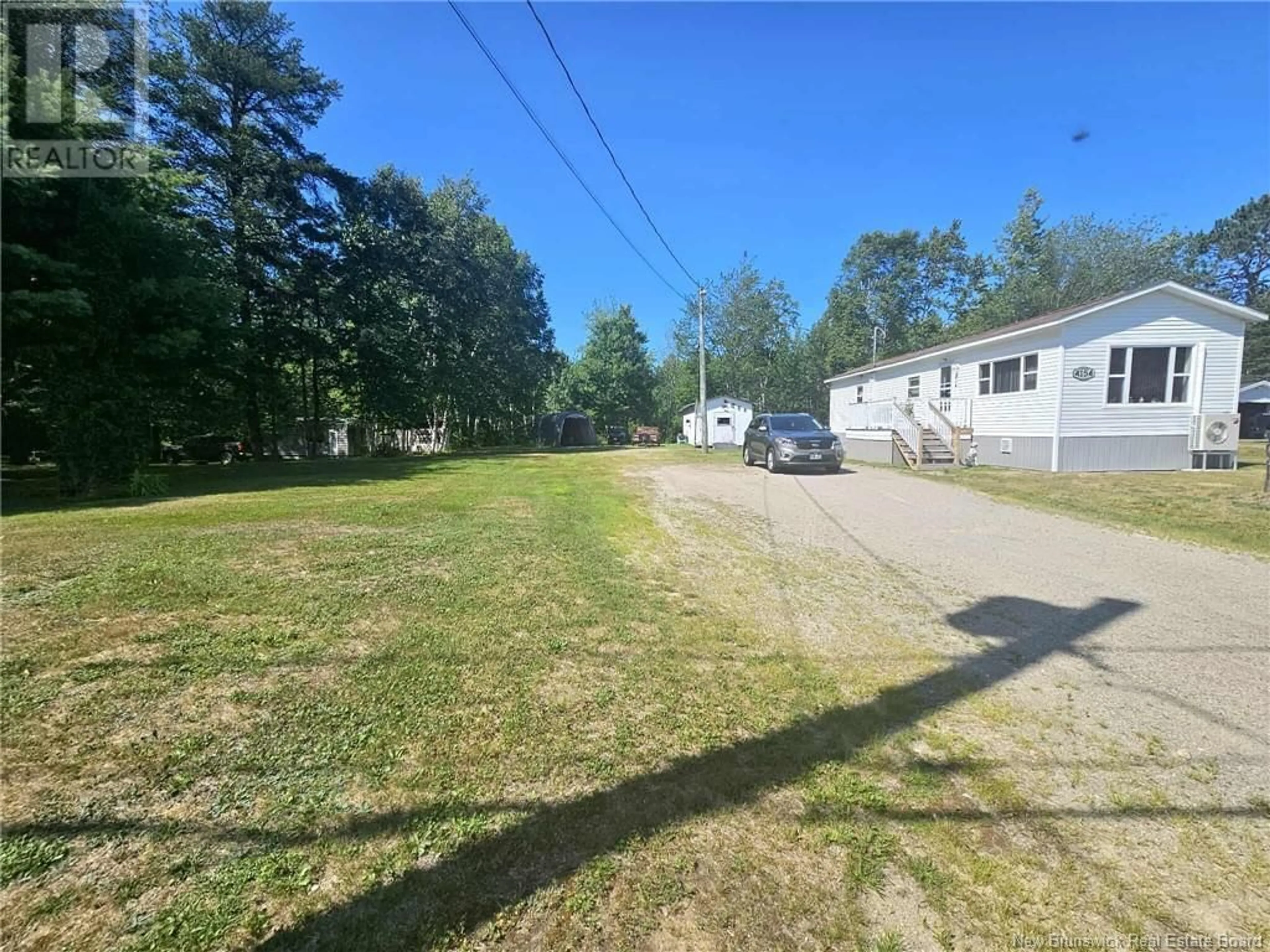A pic from outside/outdoor area/front of a property/back of a property/a pic from drone, street for 4154 ROUTE 430, Big River New Brunswick E2A6W4