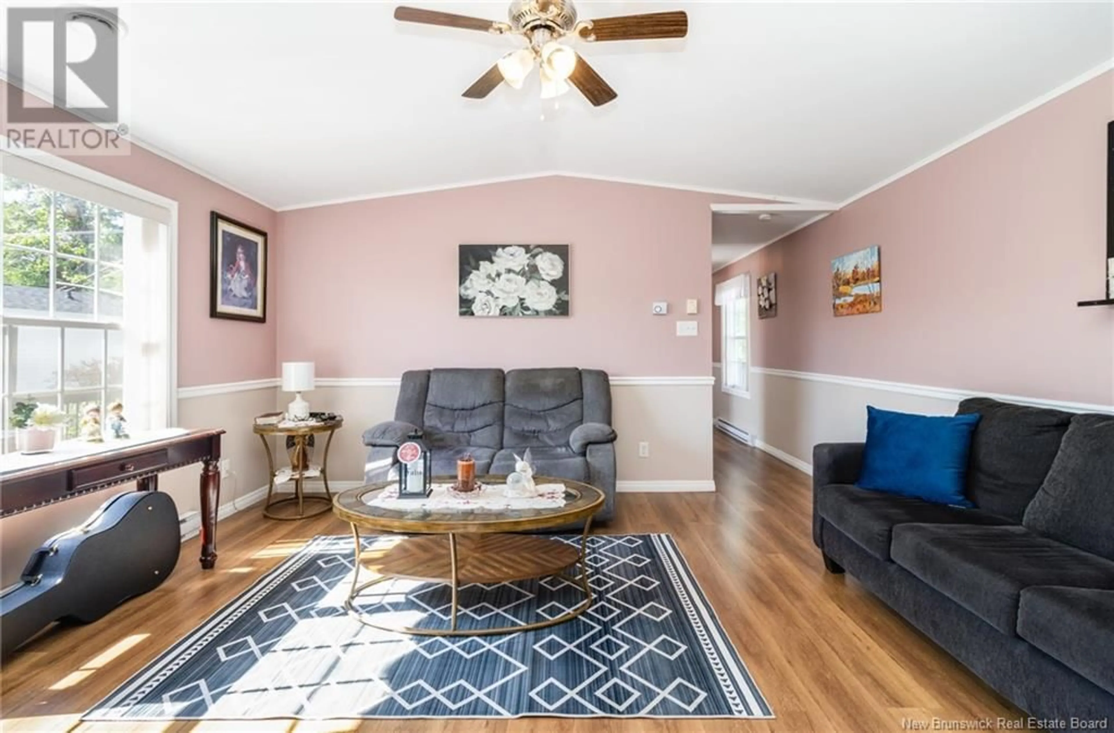 Living room with furniture, wood/laminate floor for 86 JACOB STREET, Fredericton New Brunswick E3G0N7
