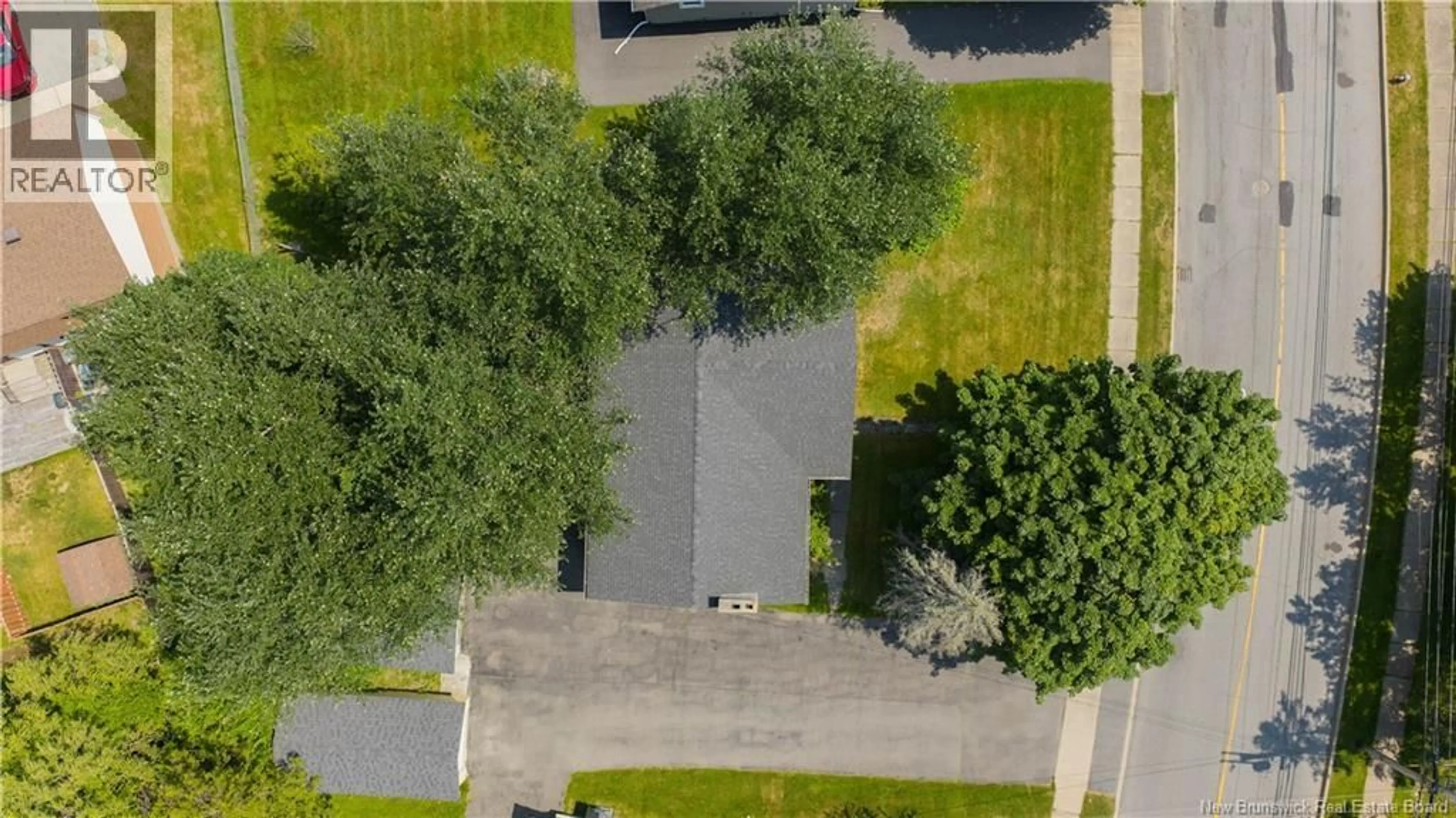 A pic from outside/outdoor area/front of a property/back of a property/a pic from drone, street for 820 SAND COVE ROAD, Saint John New Brunswick E2M3E6