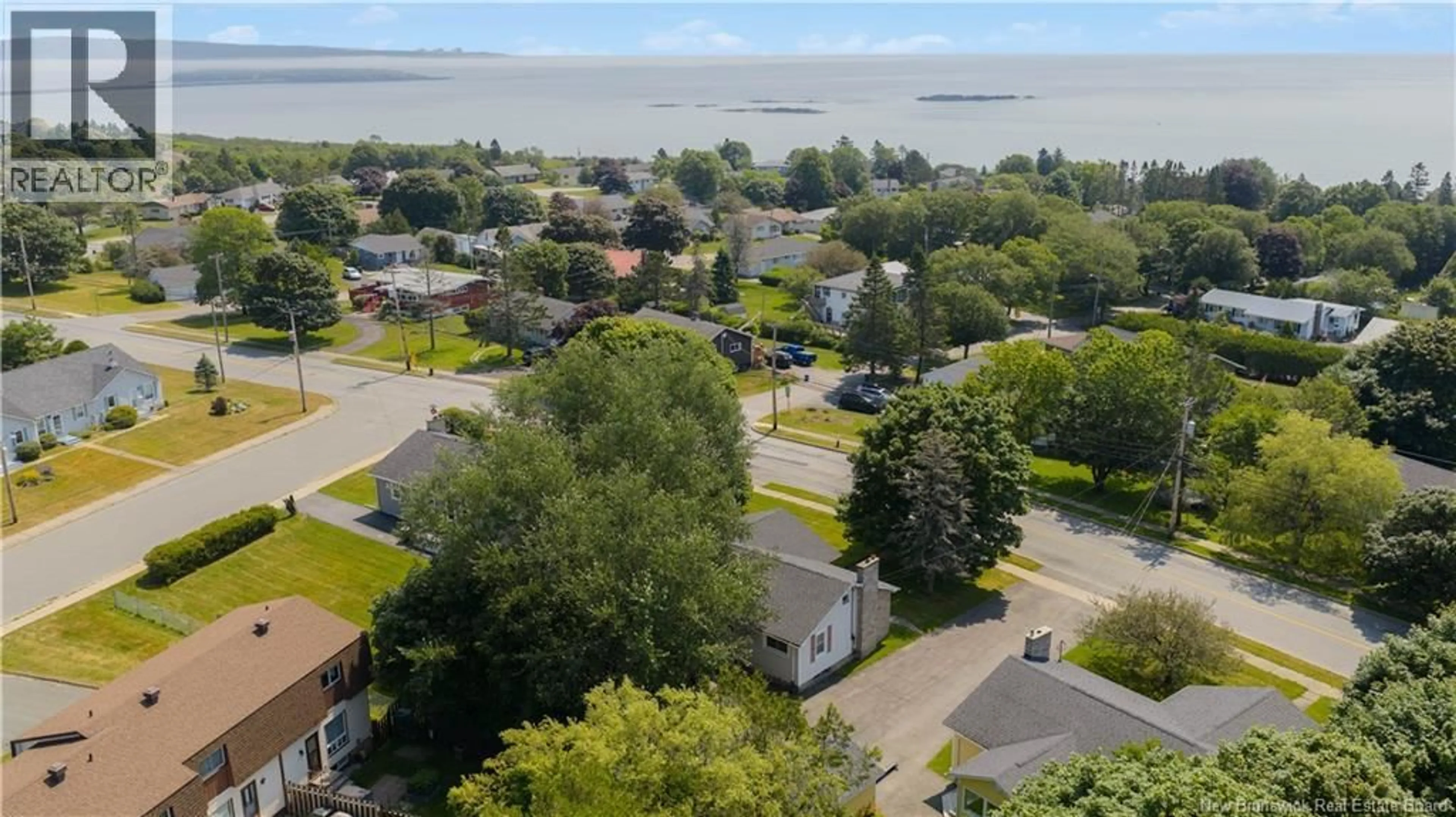 A pic from outside/outdoor area/front of a property/back of a property/a pic from drone, water/lake/river/ocean view for 820 SAND COVE ROAD, Saint John New Brunswick E2M3E6