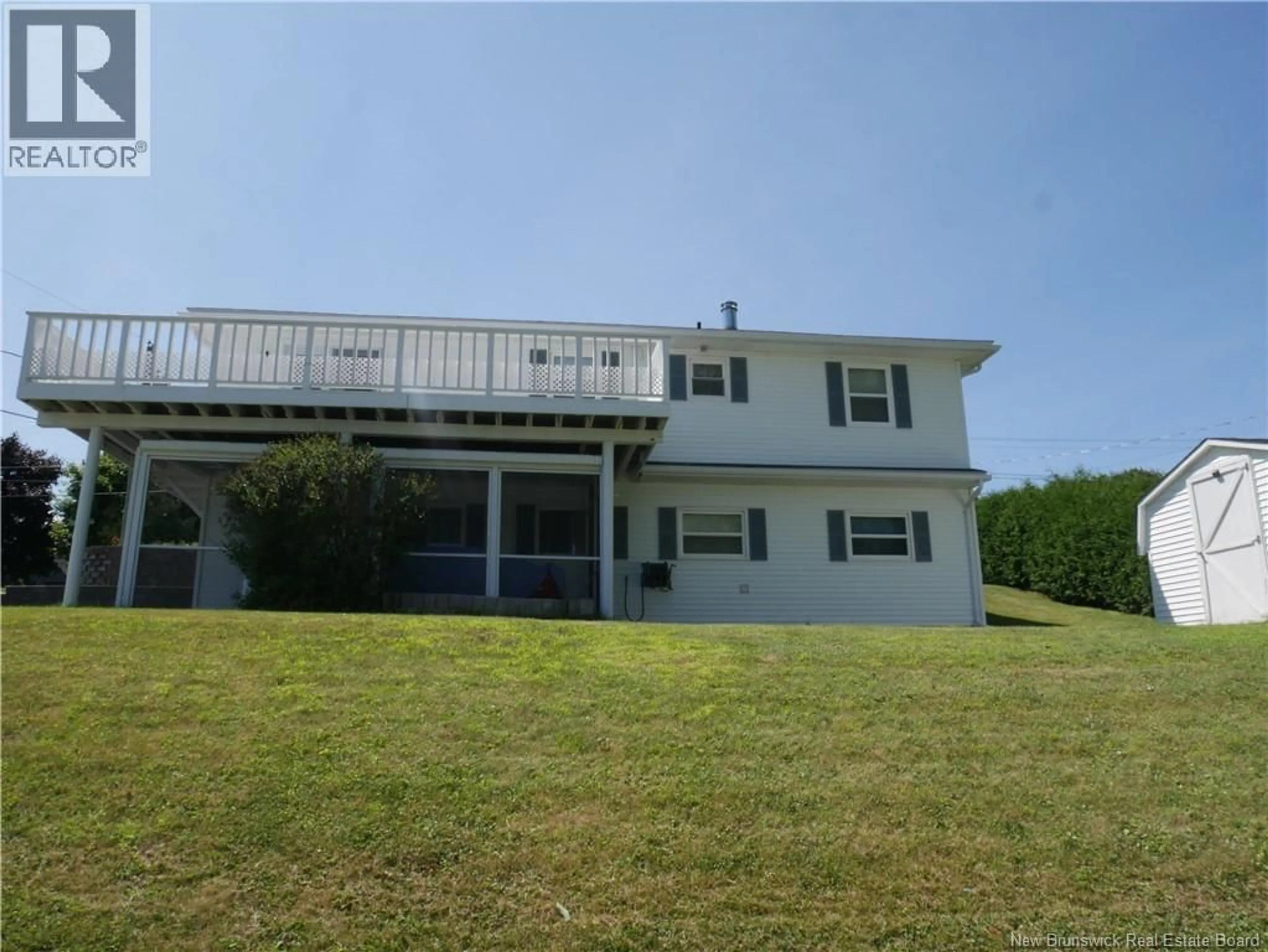 A pic from outside/outdoor area/front of a property/back of a property/a pic from drone, water/lake/river/ocean view for 124 CREIGHTON STREET, Woodstock New Brunswick E7M1N3