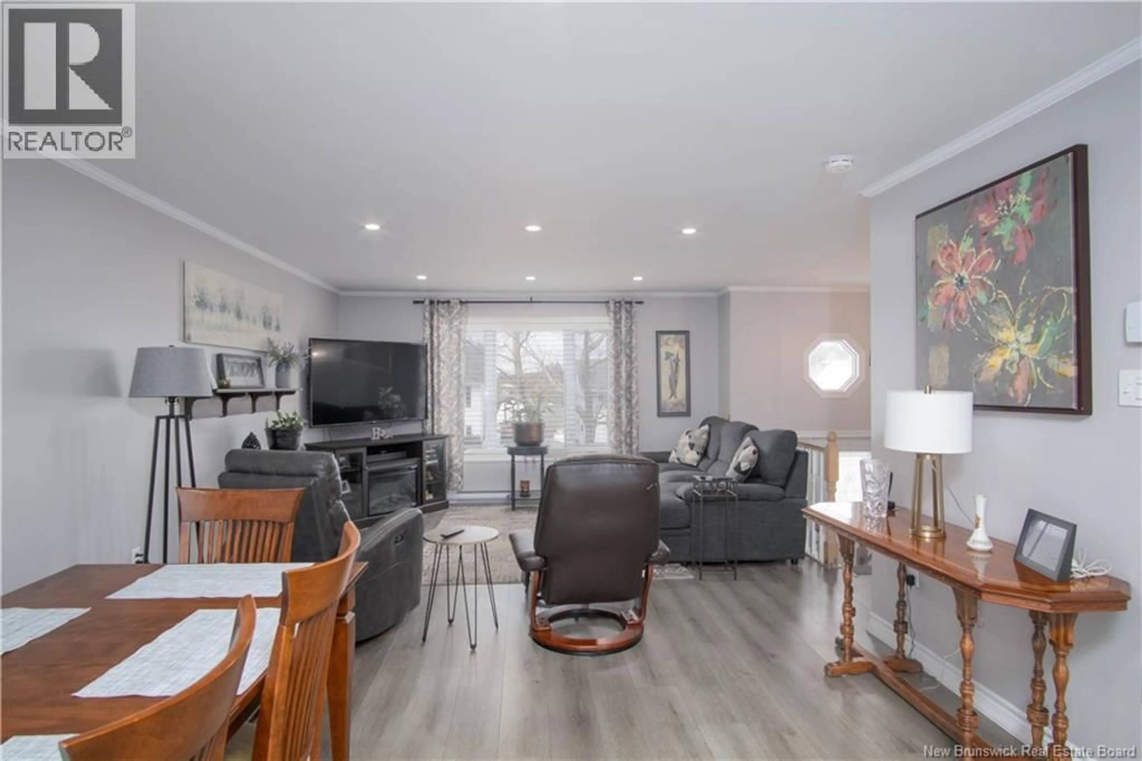 Living room with furniture, wood/laminate floor for 18 DALILA COURT, Saint John New Brunswick E2M5P9