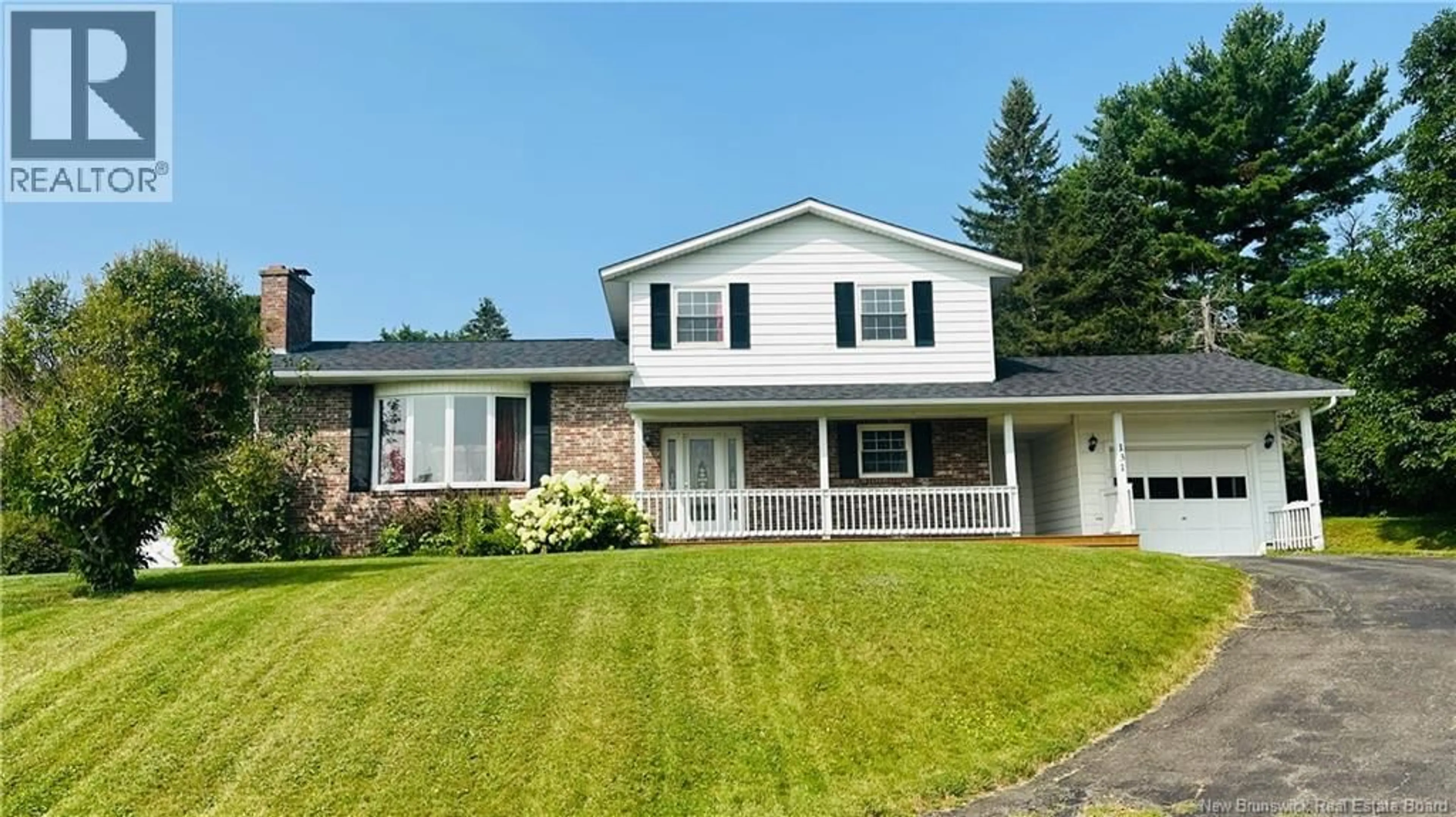 Home with vinyl exterior material, street for 131 RIVERSIDE DRIVE, Woodstock New Brunswick E7M2P4