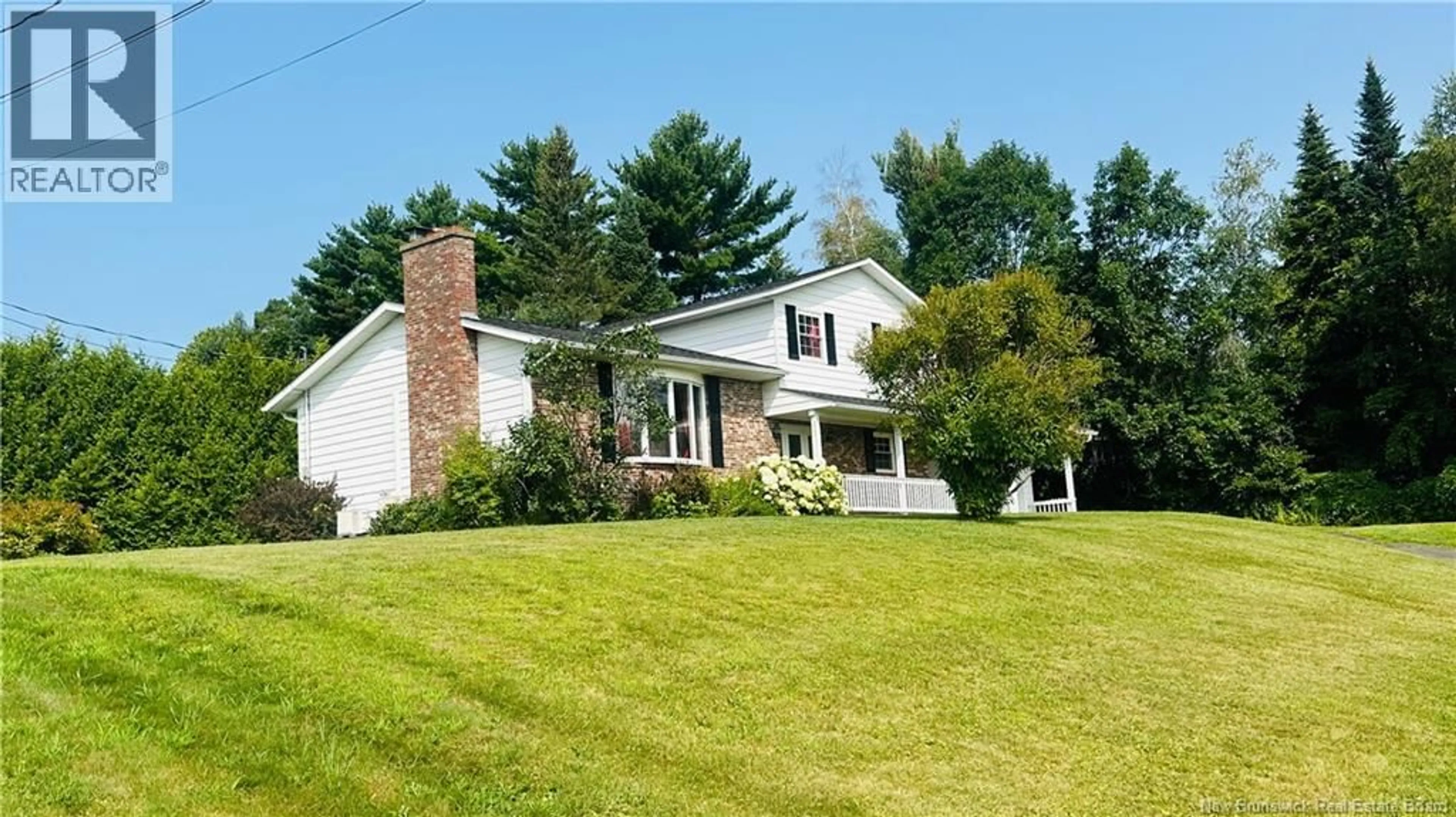 A pic from outside/outdoor area/front of a property/back of a property/a pic from drone, street for 131 RIVERSIDE DRIVE, Woodstock New Brunswick E7M2P4