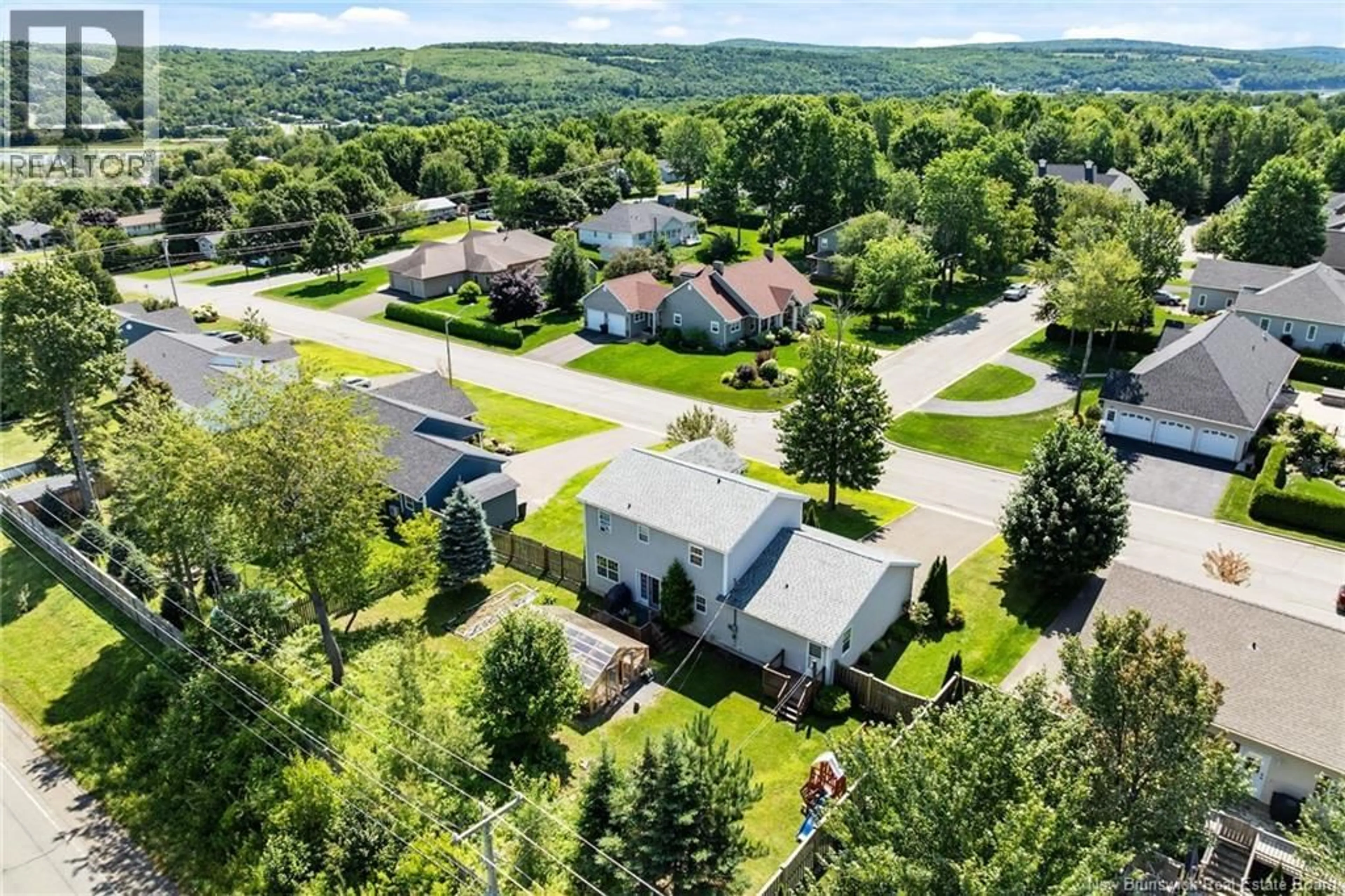 A pic from outside/outdoor area/front of a property/back of a property/a pic from drone, mountain view for 86 BICENTENNIAL DRIVE, Woodstock New Brunswick E7M6A7