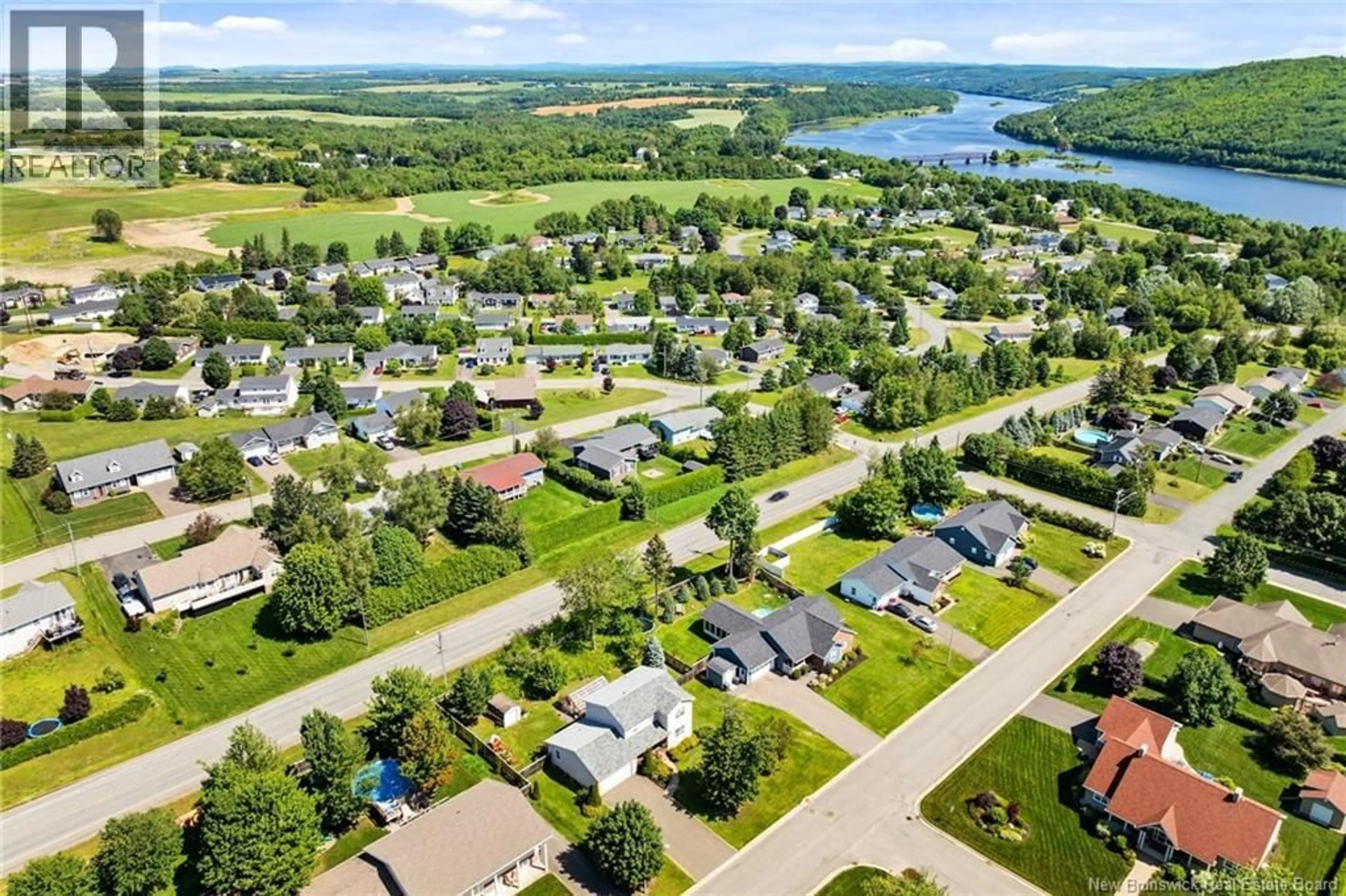 A pic from outside/outdoor area/front of a property/back of a property/a pic from drone, water/lake/river/ocean view for 86 BICENTENNIAL DRIVE, Woodstock New Brunswick E7M6A7