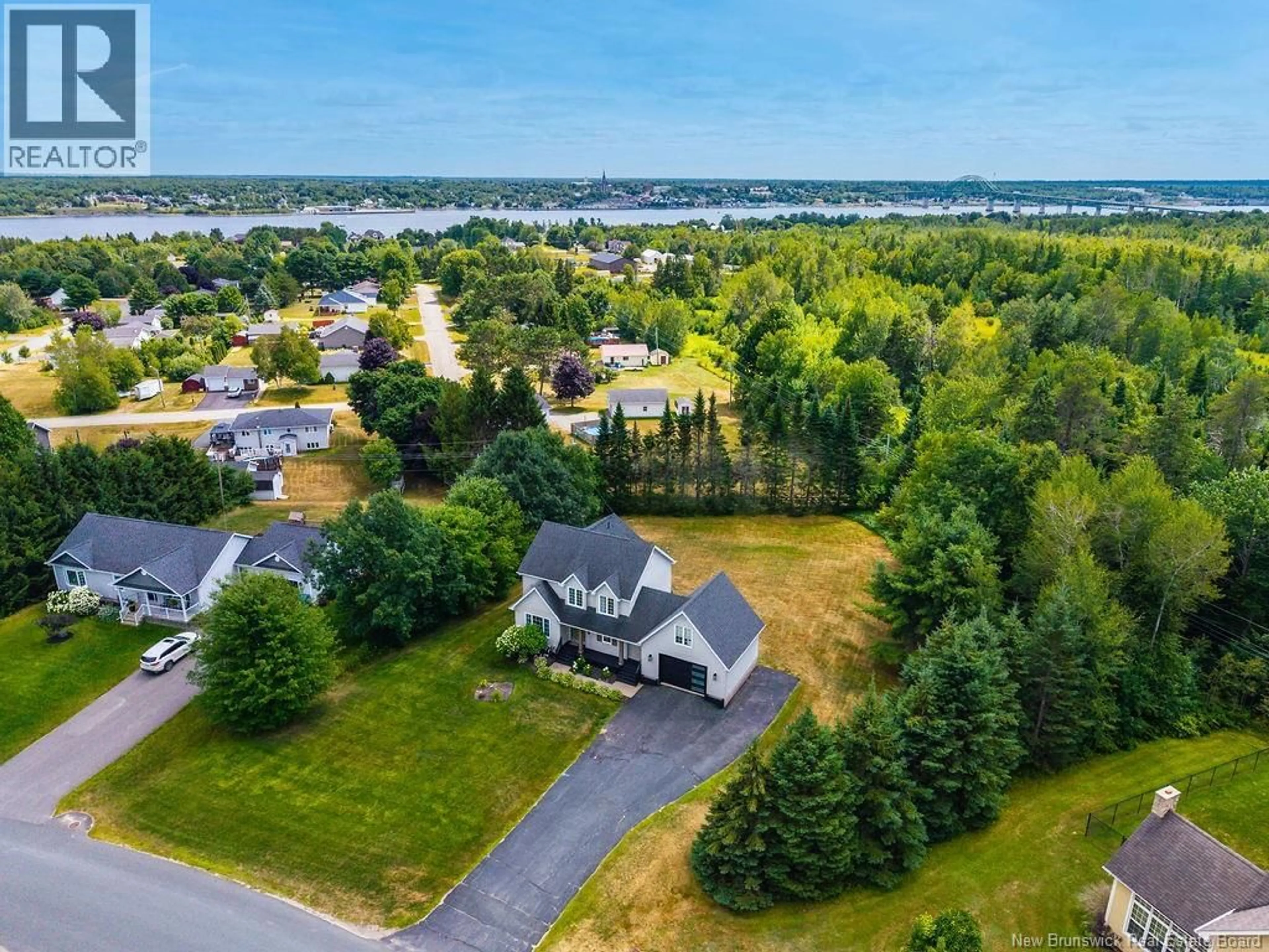 A pic from outside/outdoor area/front of a property/back of a property/a pic from drone, water/lake/river/ocean view for 120 CENTURY DRIVE, Miramichi New Brunswick E1V4A7