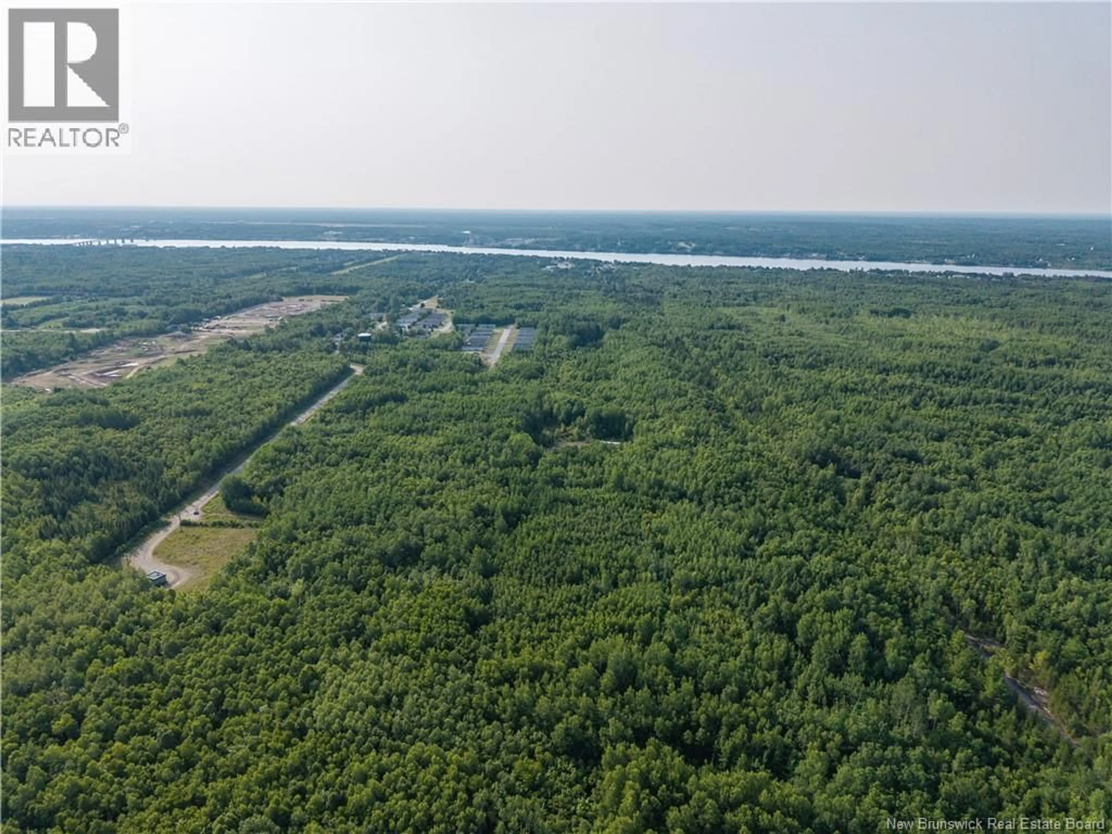A pic from outside/outdoor area/front of a property/back of a property/a pic from drone, forest/trees view for 15 MCKINNON ROAD, Miramichi New Brunswick E1V5Y1