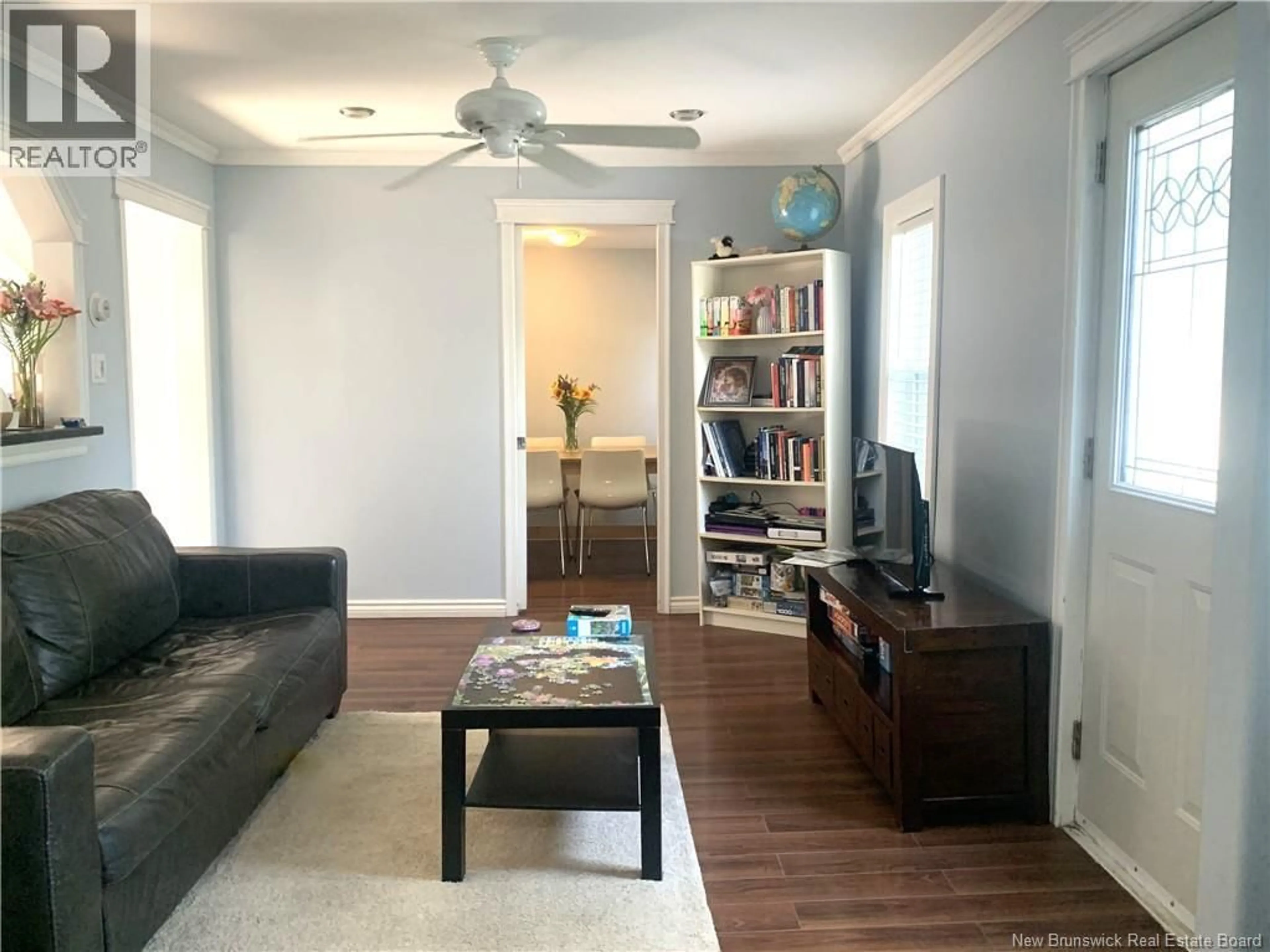 Living room with furniture, wood/laminate floor for 47 WATTERS DRIVE, Fredericton New Brunswick E3A3S9