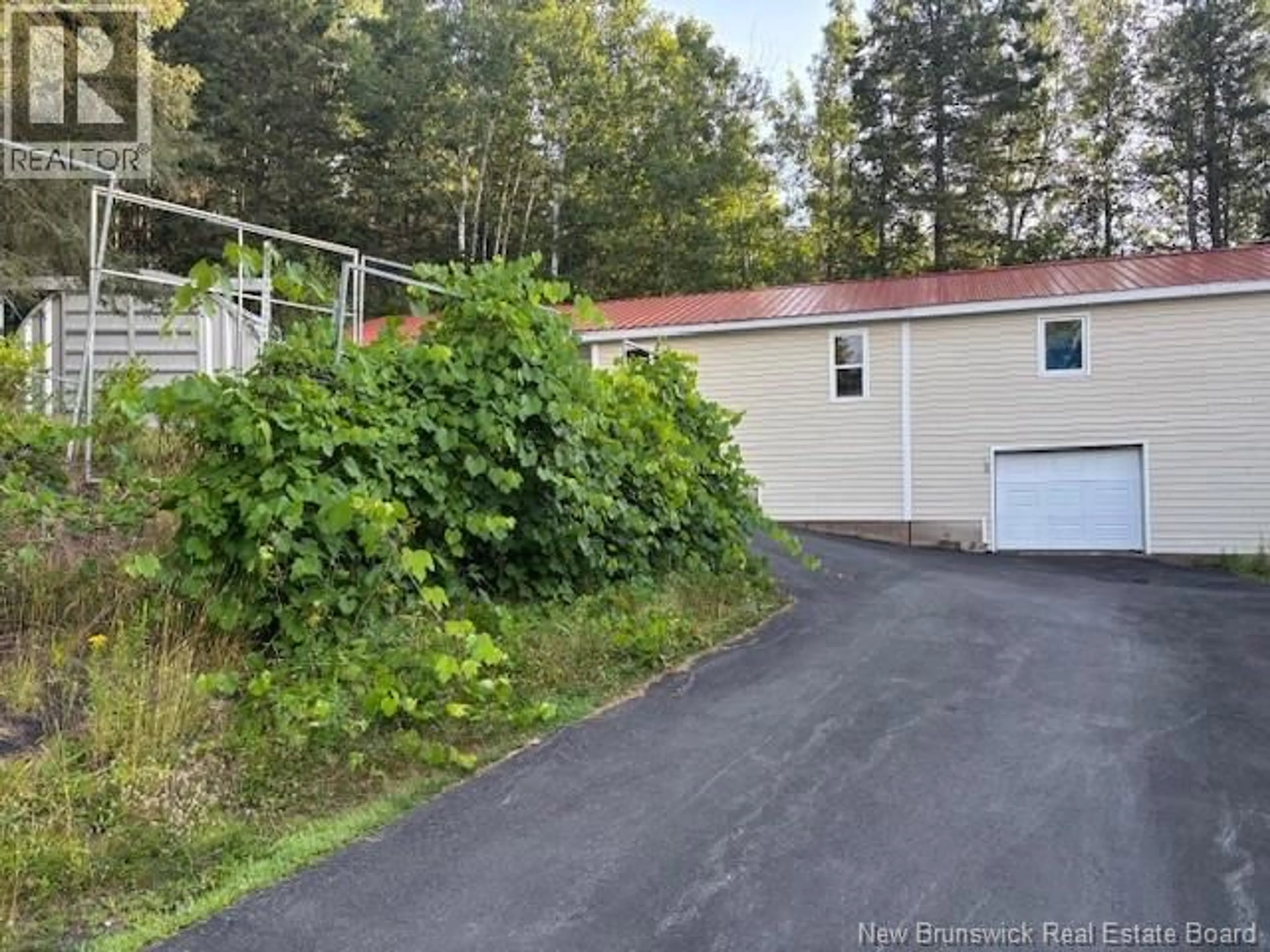A pic from outside/outdoor area/front of a property/back of a property/a pic from drone, unknown for 531 BACK ROAD, Penobsquis New Brunswick E4G1Z5