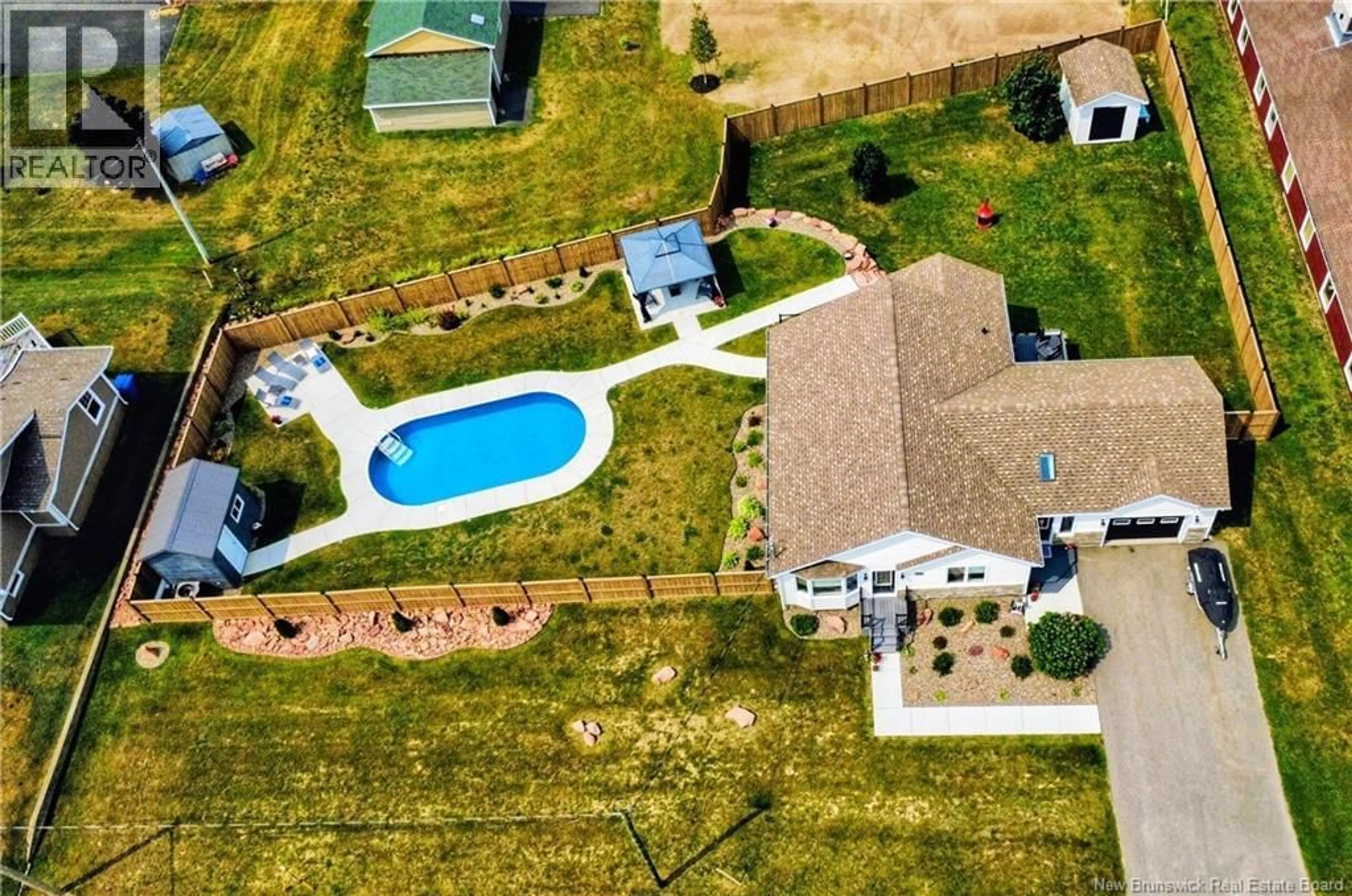 A pic from outside/outdoor area/front of a property/back of a property/a pic from drone, water/lake/river/ocean view for 259 RUE SAVARD, Caraquet New Brunswick E1W1A6