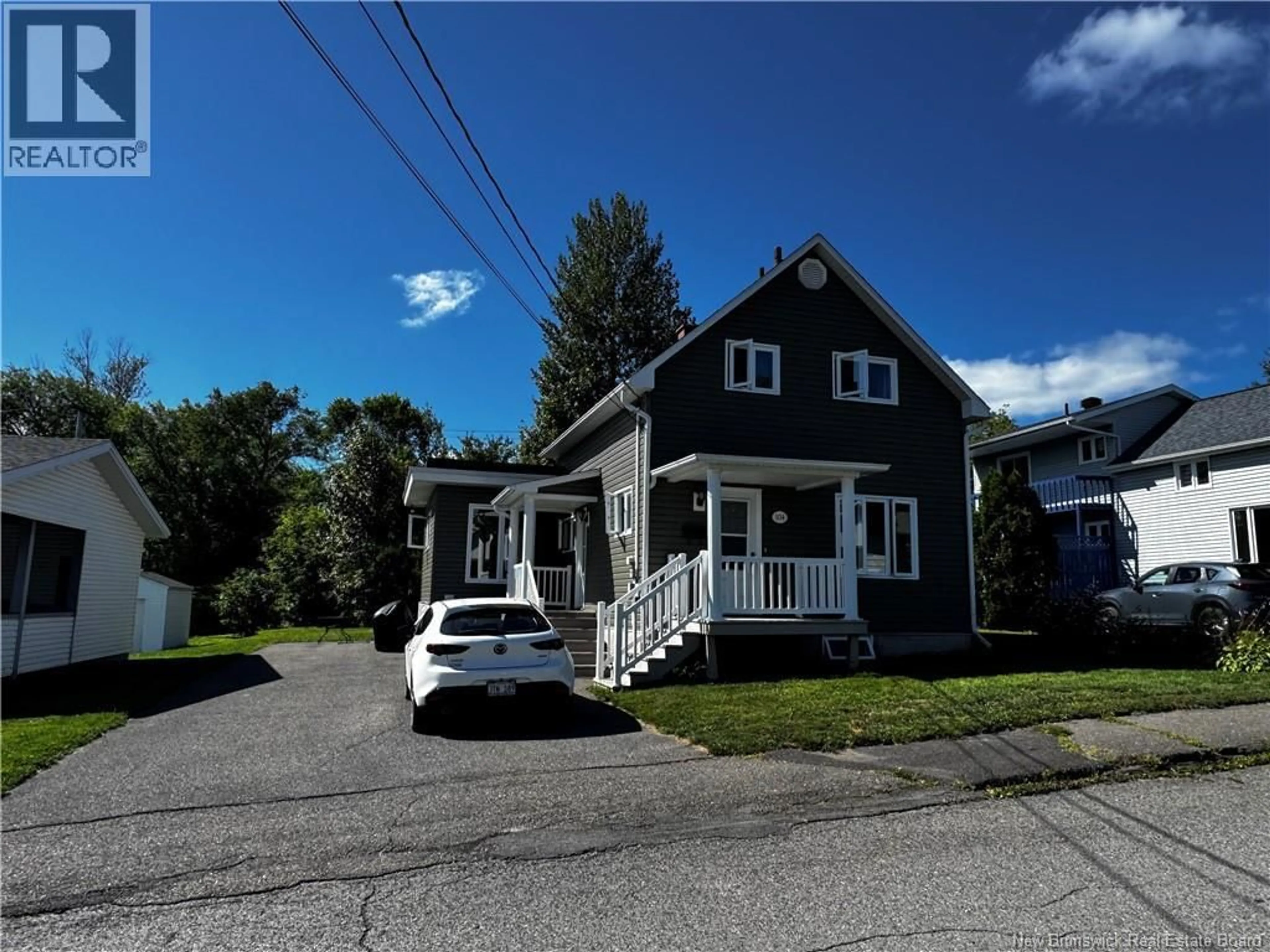 Home with vinyl exterior material, street for 104 ST-GEORGE AVENUE, Edmundston New Brunswick E3V2W2