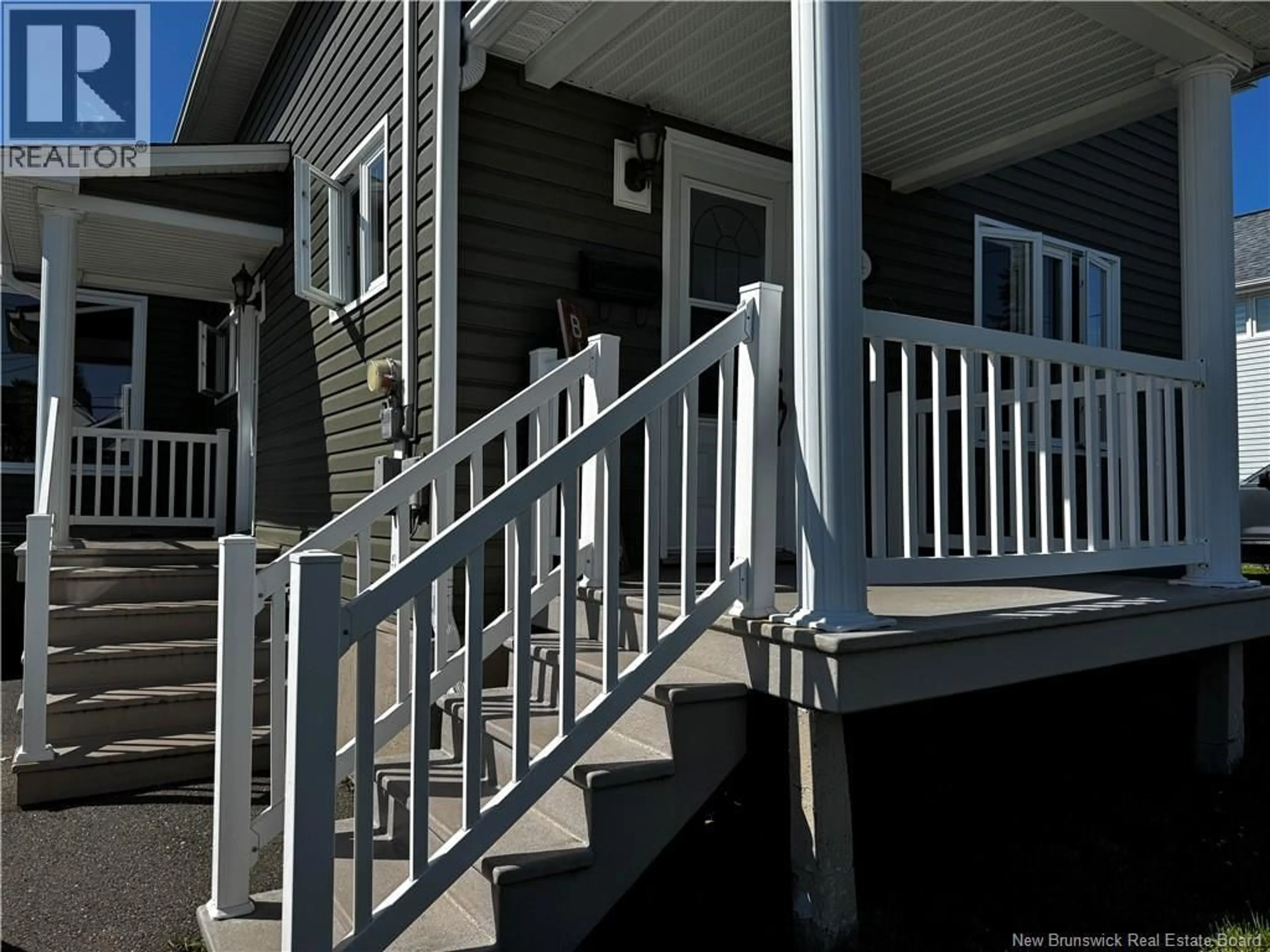 Home with vinyl exterior material, street for 104 ST-GEORGE AVENUE, Edmundston New Brunswick E3V2W2