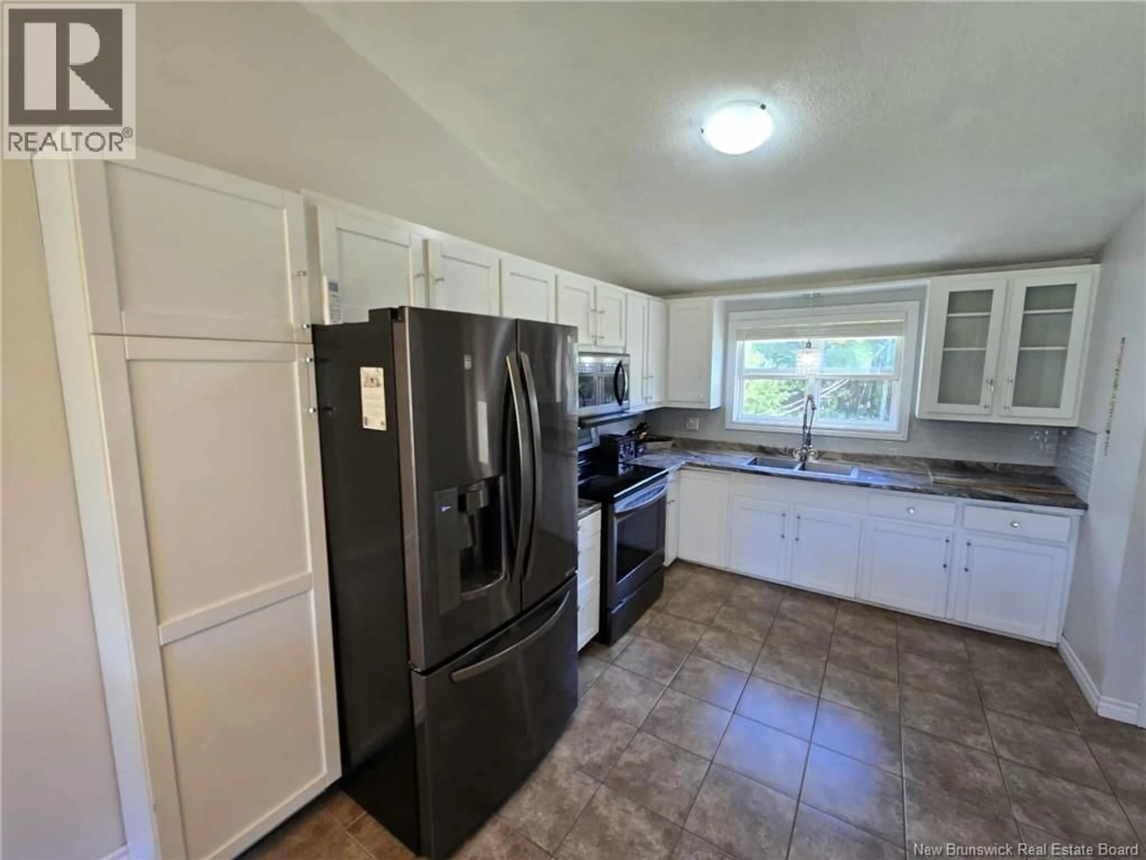Standard kitchen, ceramic/tile floor for 363 HERITAGE STREET, Beresford New Brunswick E8K2C7